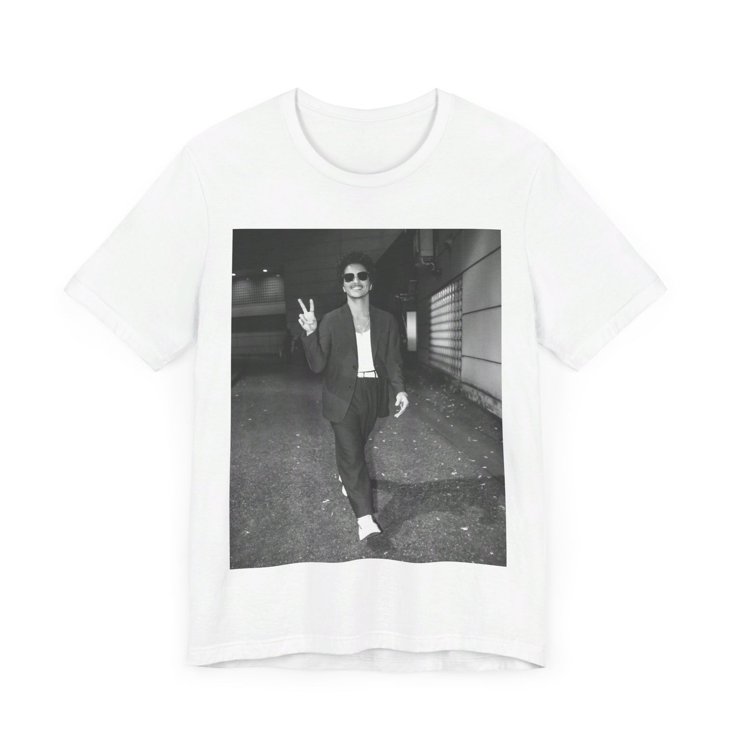 A black graphic t-shirt featuring a black and white graphic or photo of Bruno Mars in a backstage setting.