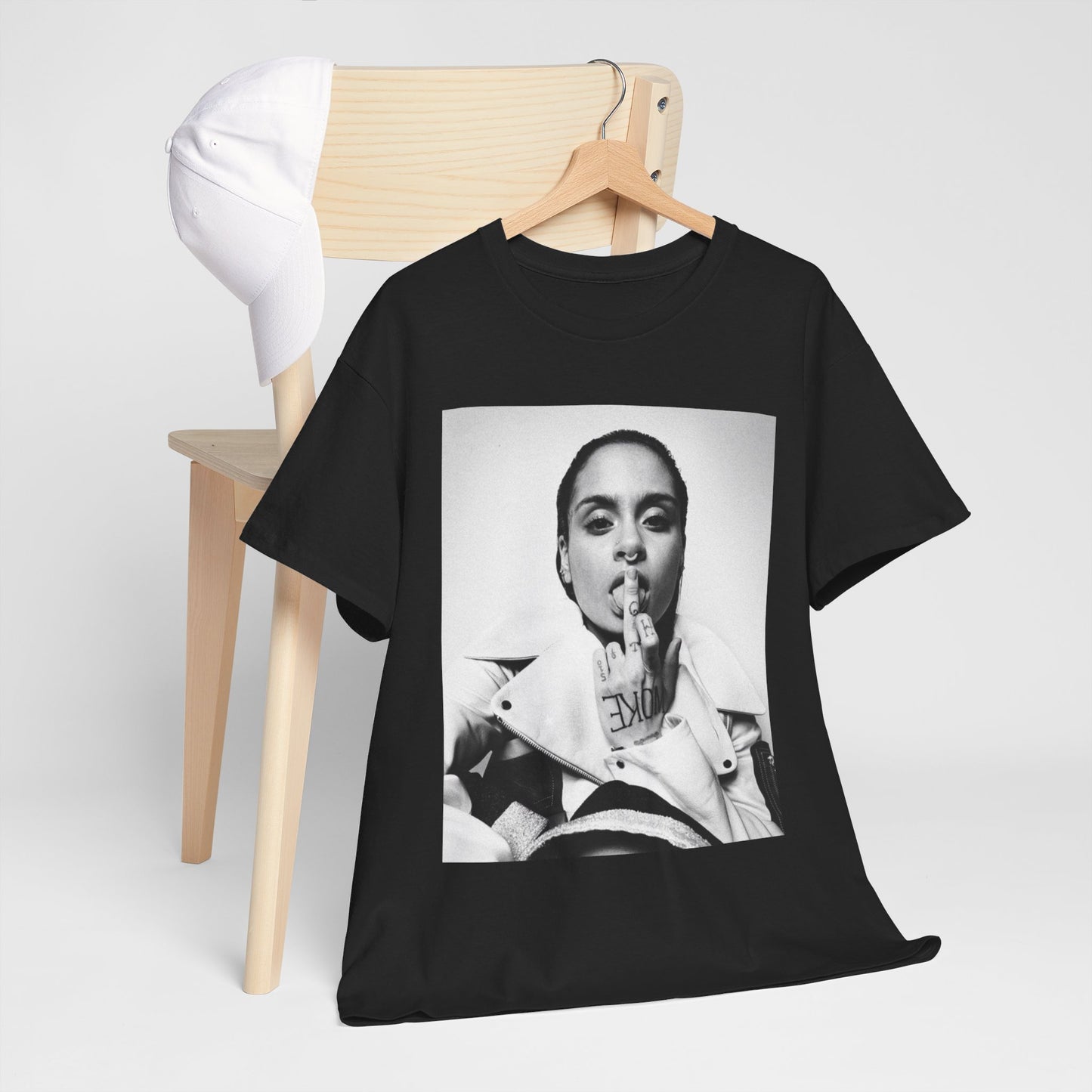 A black graphic t-shirt featuring a soulful indie pop graphic of Kehlani.