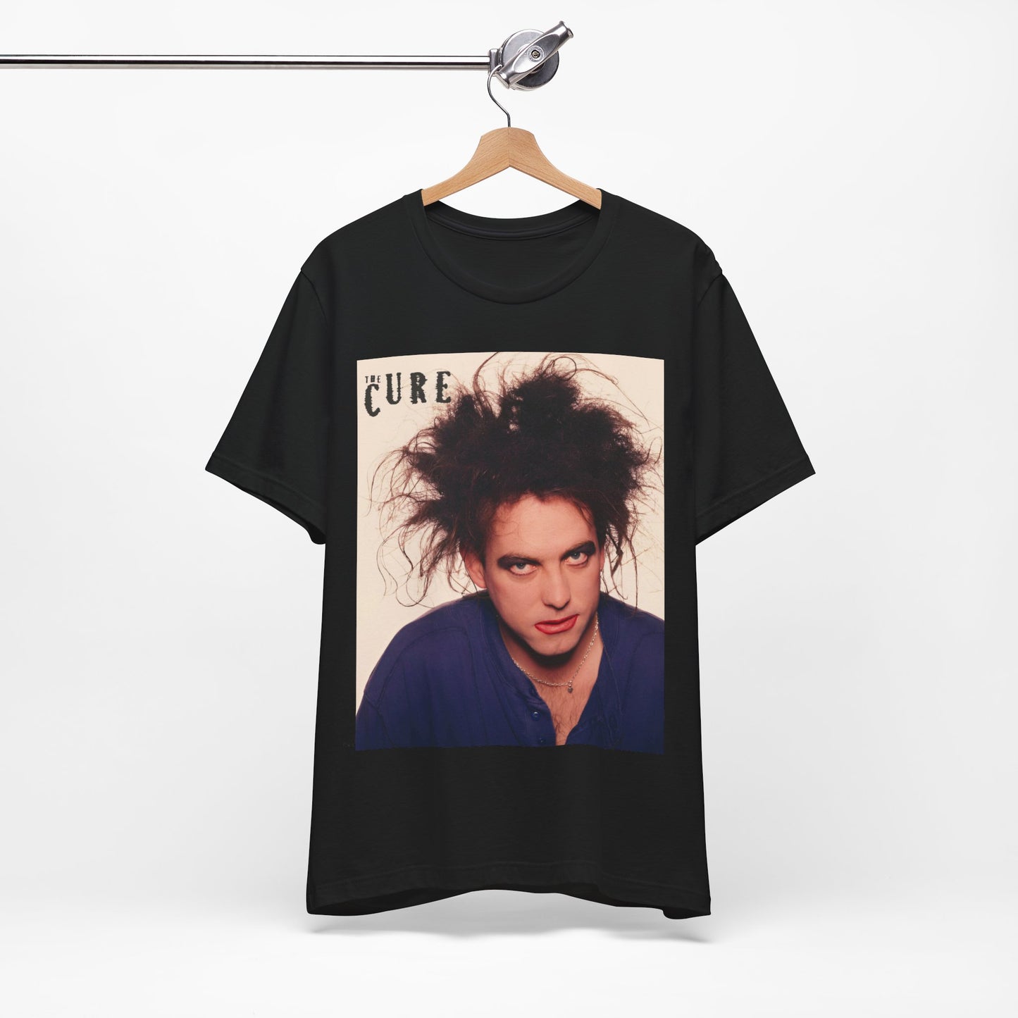 A black graphic t-shirt featuring a photo portrait of Robert Smith from The Cure.