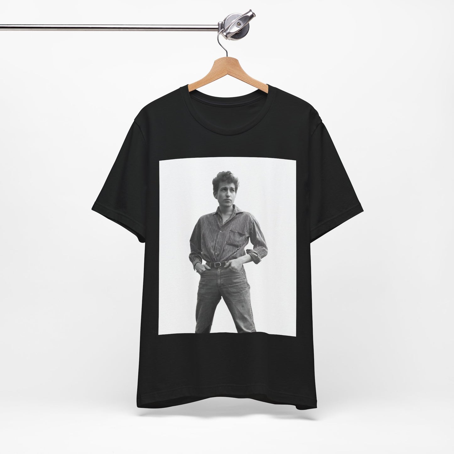 A black graphic t-shirt featuring a vintage 60s folk aesthetic graphic of Bob Dylan.