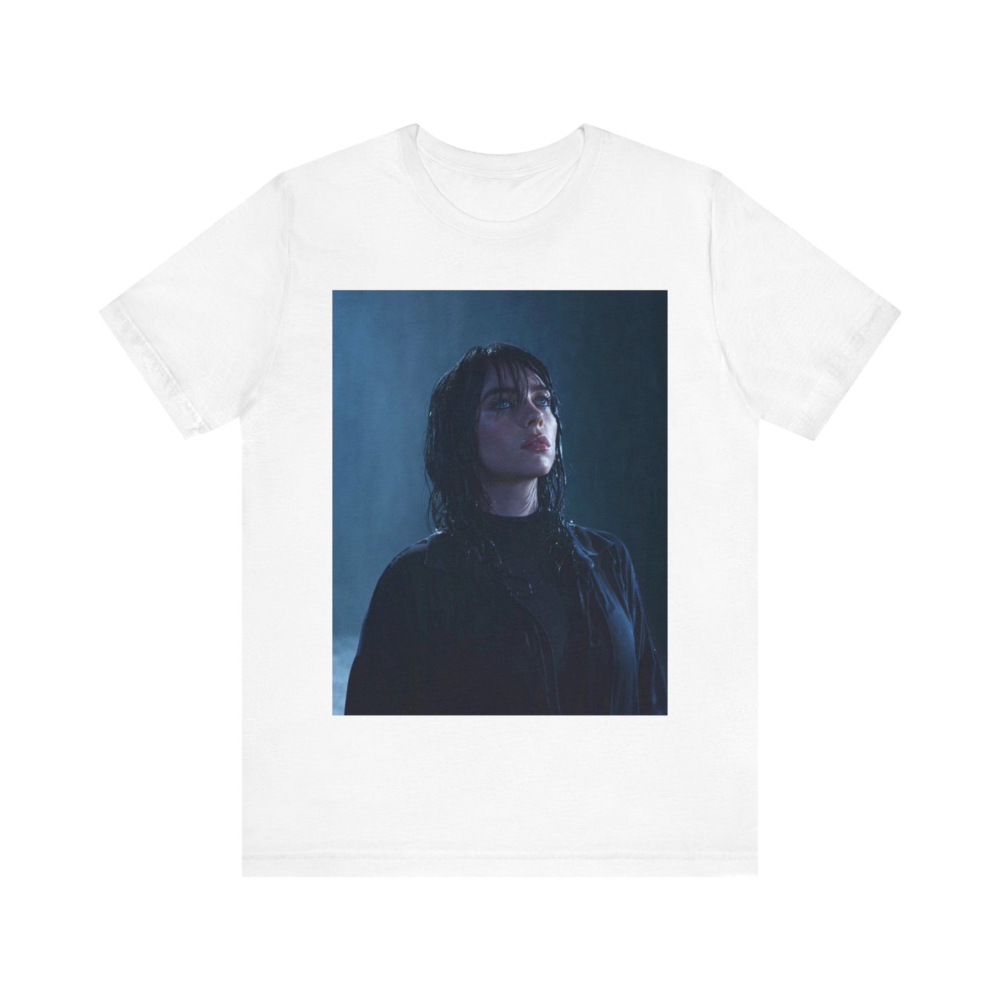 A direct, powerful portrait of Billie Eilish, embodying the 'HIT ME HARD AND SOFT' album era, printed on a graphic t-shirt.