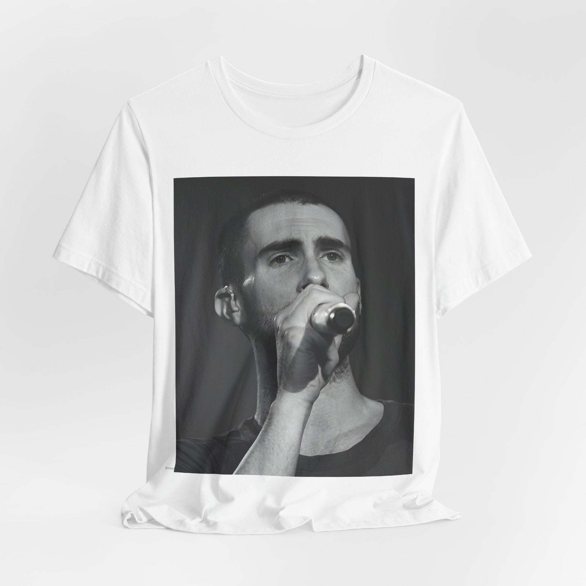 A rare, vintage black and white photo of a very young Maroon 5, from their early garage band days, printed on a t-shirt.