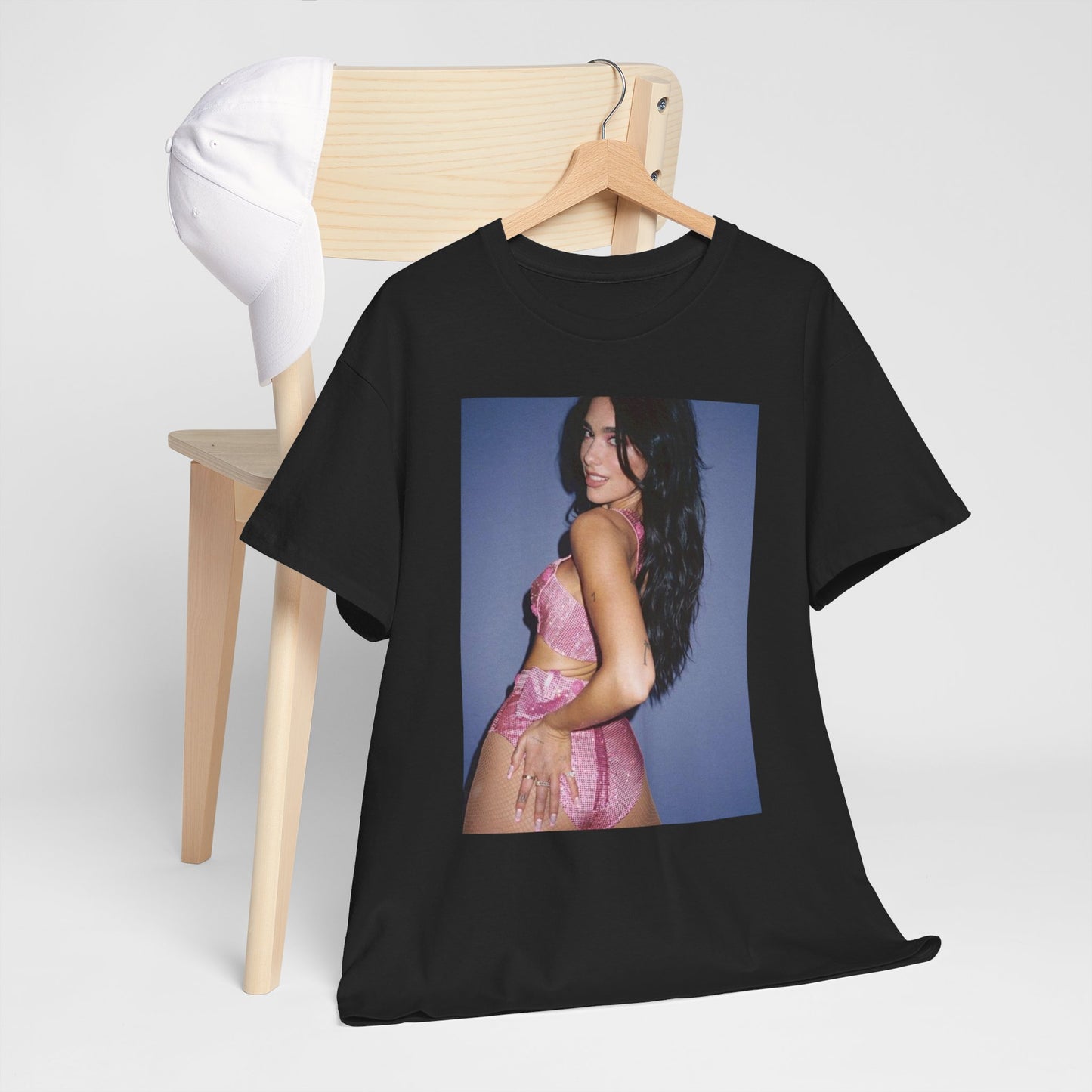 A black graphic t-shirt featuring a glamorous graphic of Dua Lipa, evoking her "Future Nostalgia" era.