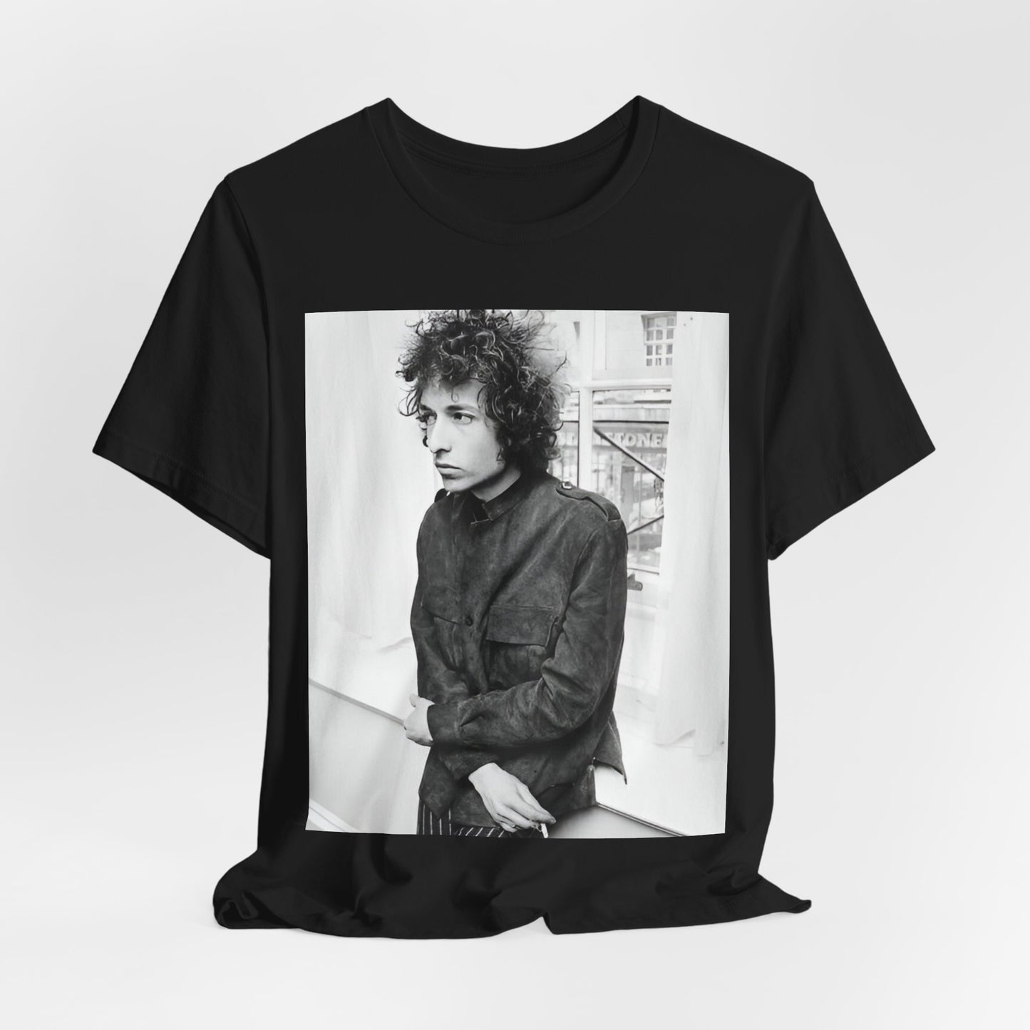 A black graphic t-shirt featuring a classic Americana-style graphic of Bob Dylan, possibly with folk elements.