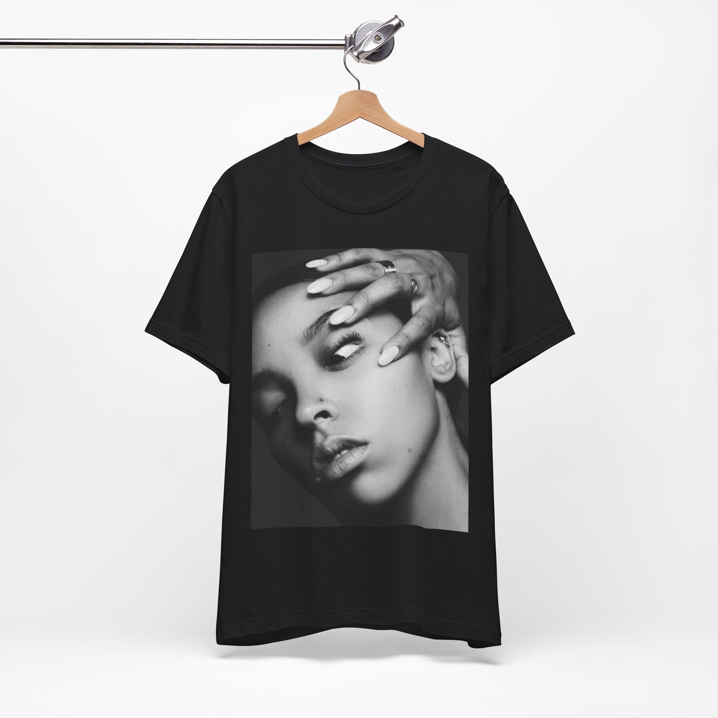 A black graphic t-shirt featuring a black and white, monochrome graphic or photo of Tinashe.