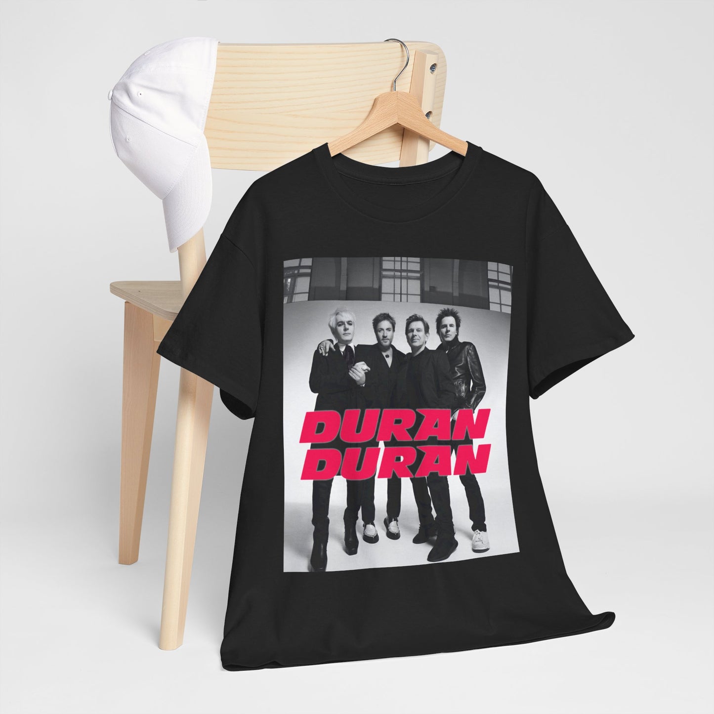 A black graphic t-shirt featuring a glam pop aesthetic graphic of Duran Duran.