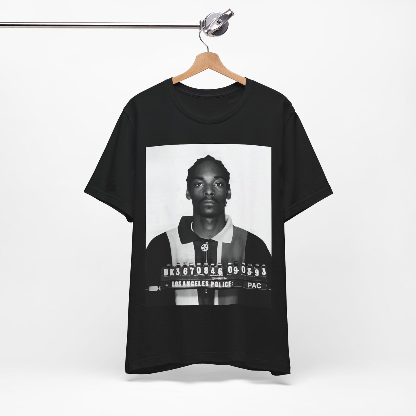 A black graphic t-shirt featuring a graphic of Snoop Dogg's mug shot.