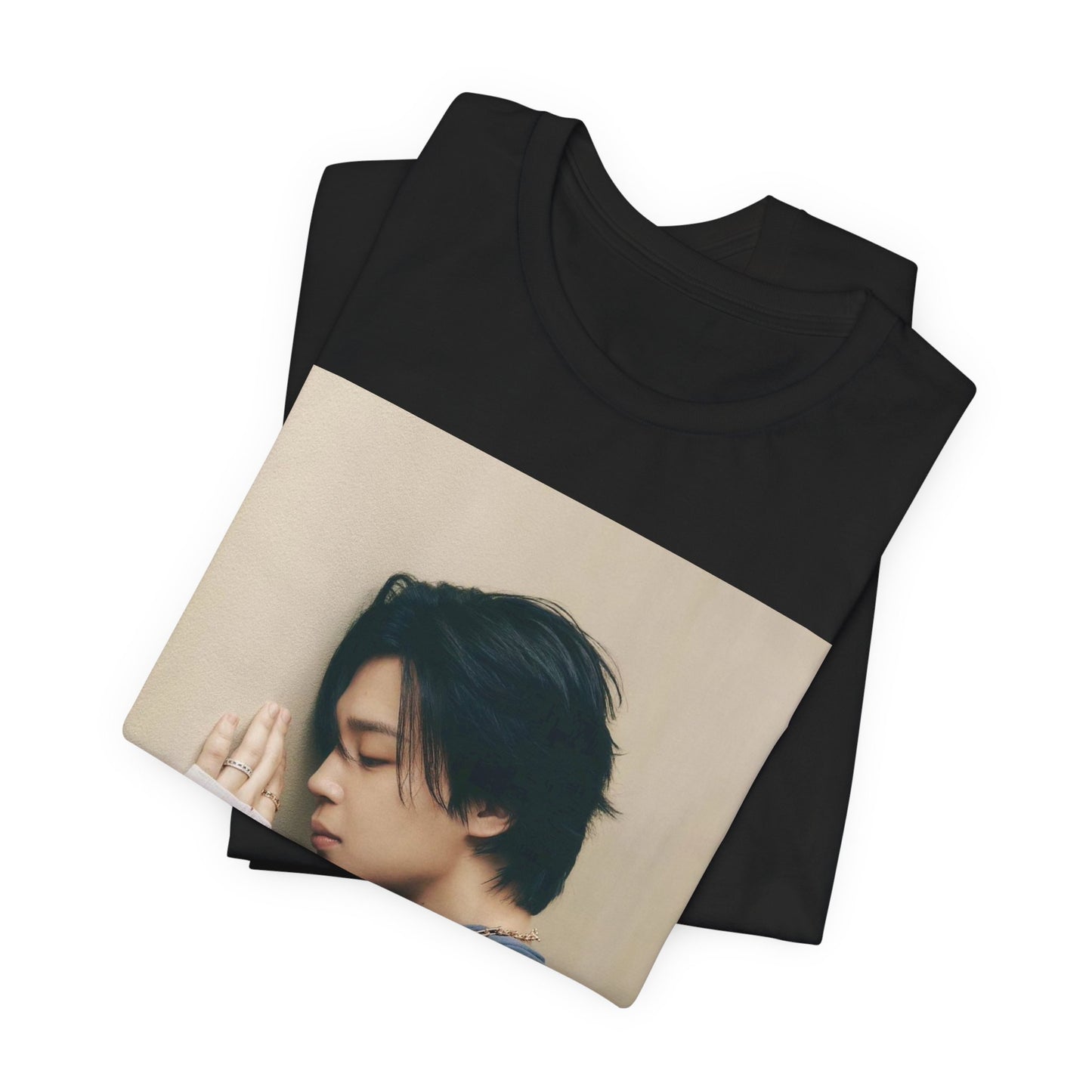 A black graphic t-shirt featuring a cool K-Pop idol essential graphic of Jimin.
