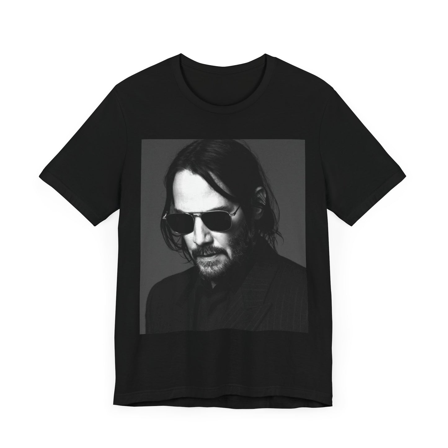 A black graphic t-shirt featuring a graphic of Keanu Reeves with a rebel spirit aesthetic.
