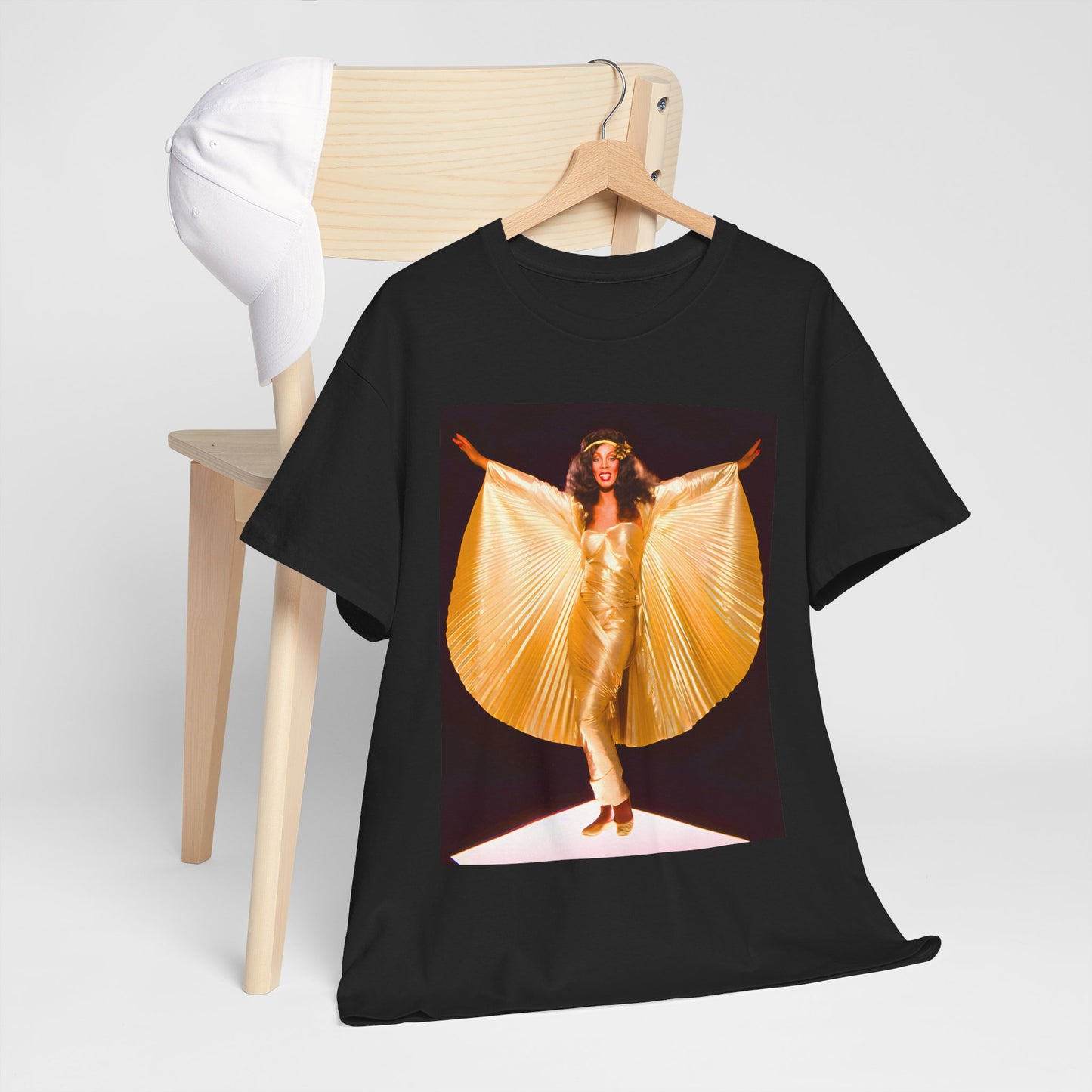 A black graphic t-shirt featuring a vintage graphic of Donna Summer as the Queen of Disco.