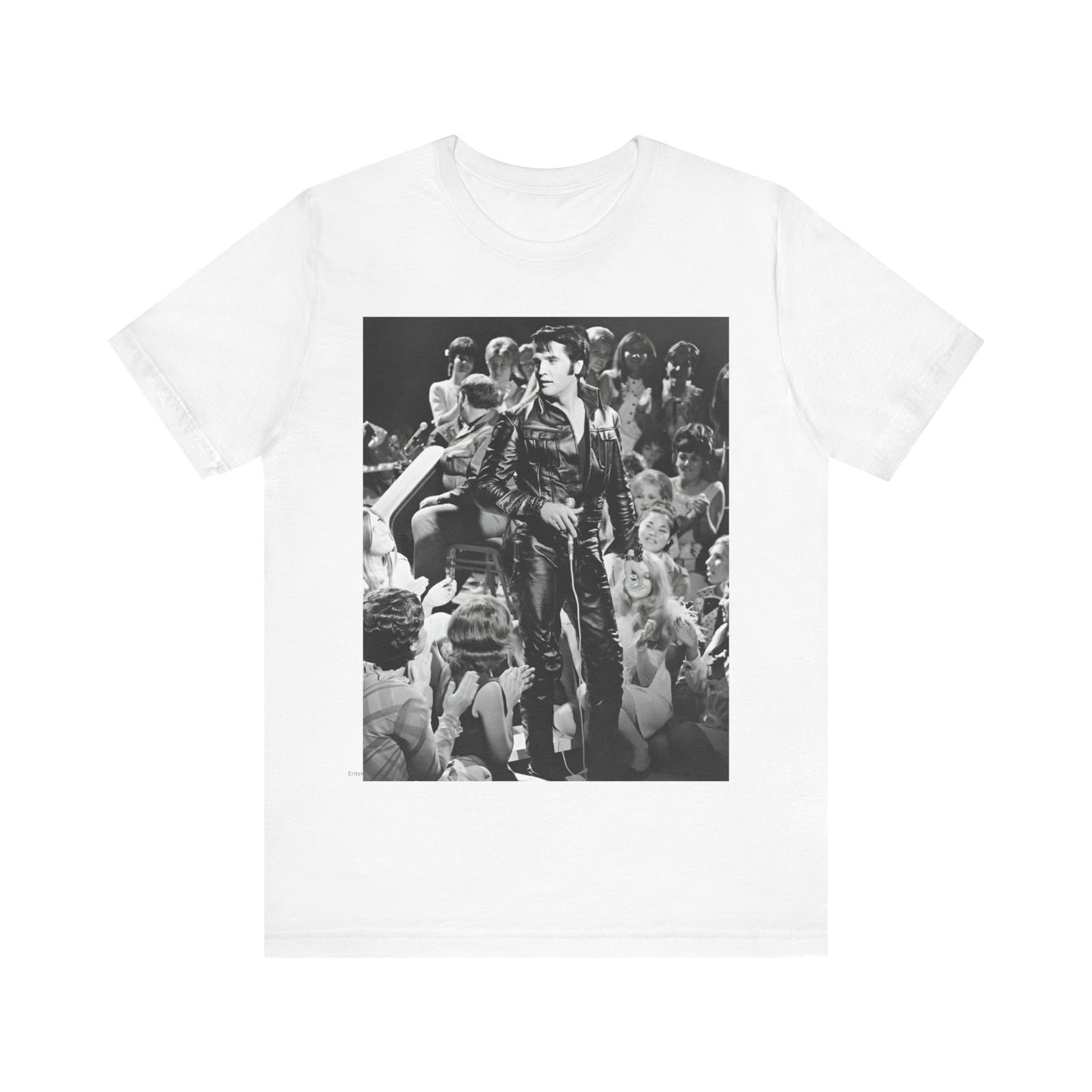A black graphic t-shirt featuring a vintage black and white photo or graphic of Elvis Presley performing live on stage.