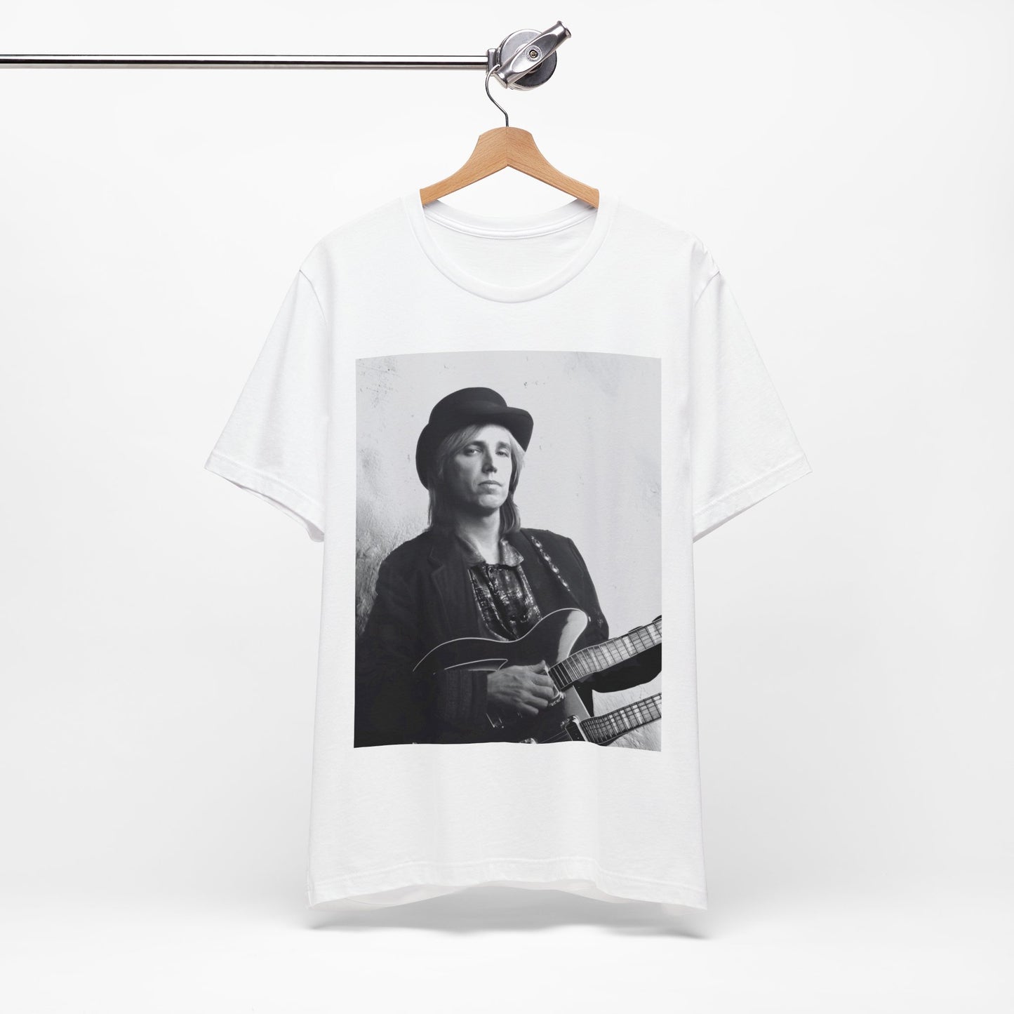 A black graphic t-shirt featuring a graphic related to Tom Petty's 'Wildflowers' album era.