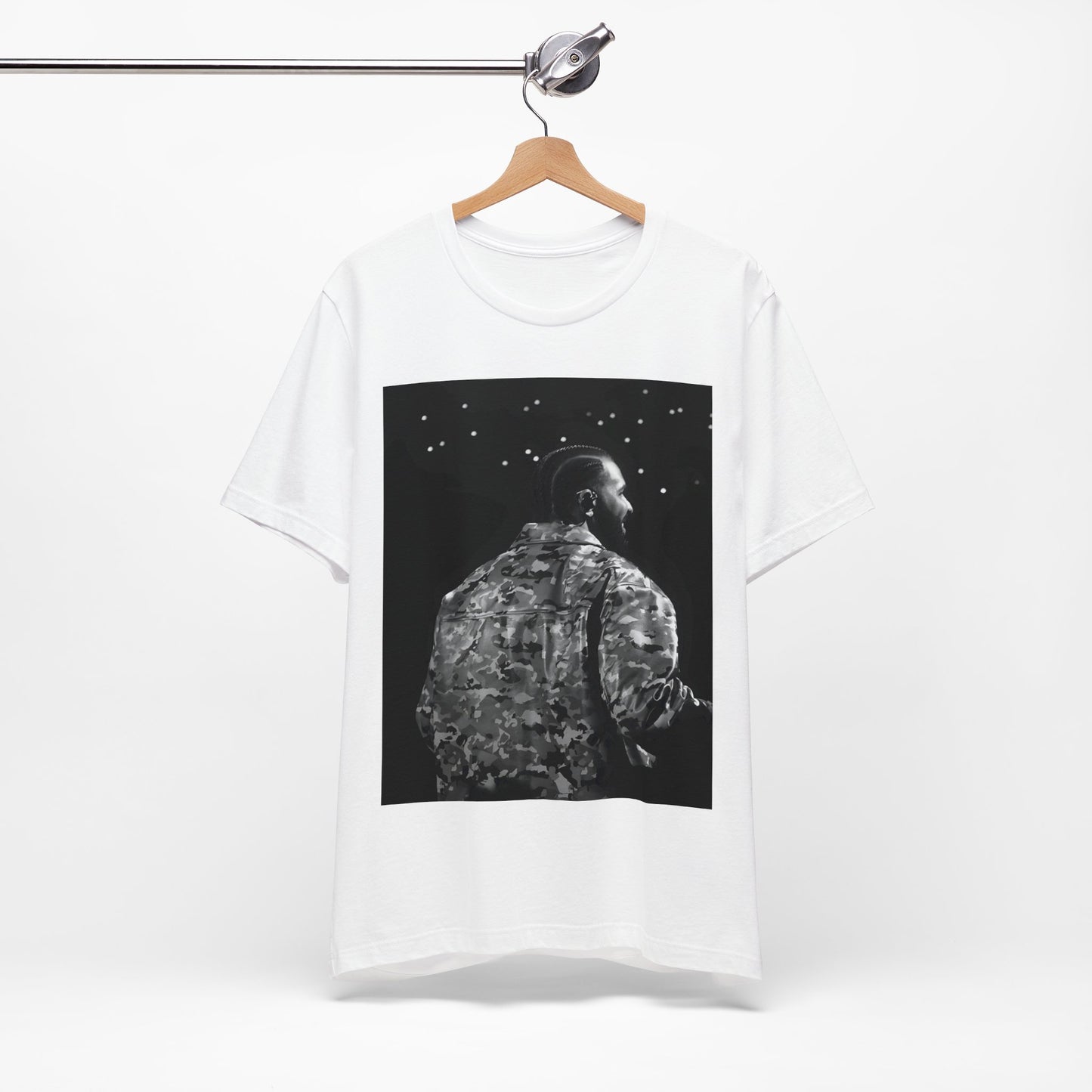 A black graphic t-shirt featuring a black and white graphic or photo of Drake performing live on stage.