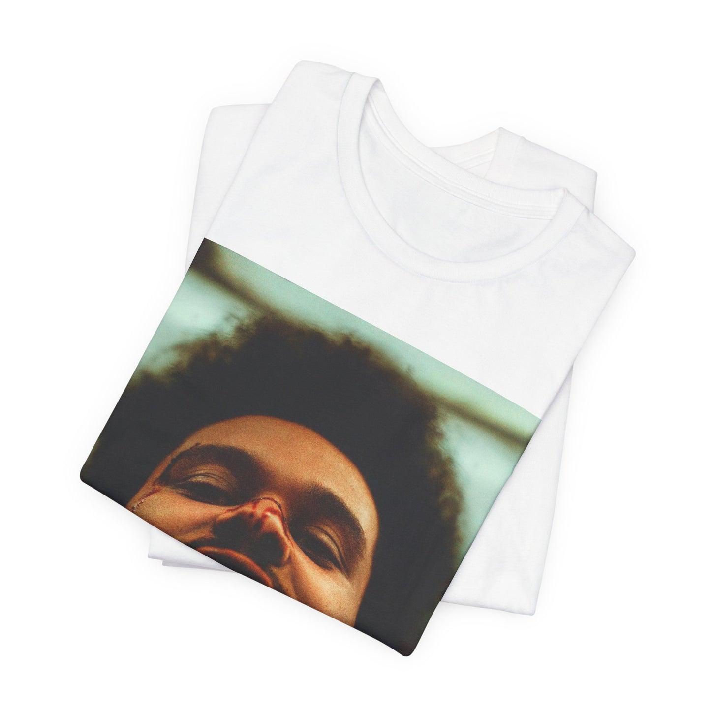 A black graphic t-shirt featuring the album cover art for The Weeknd's 'After Hours'.