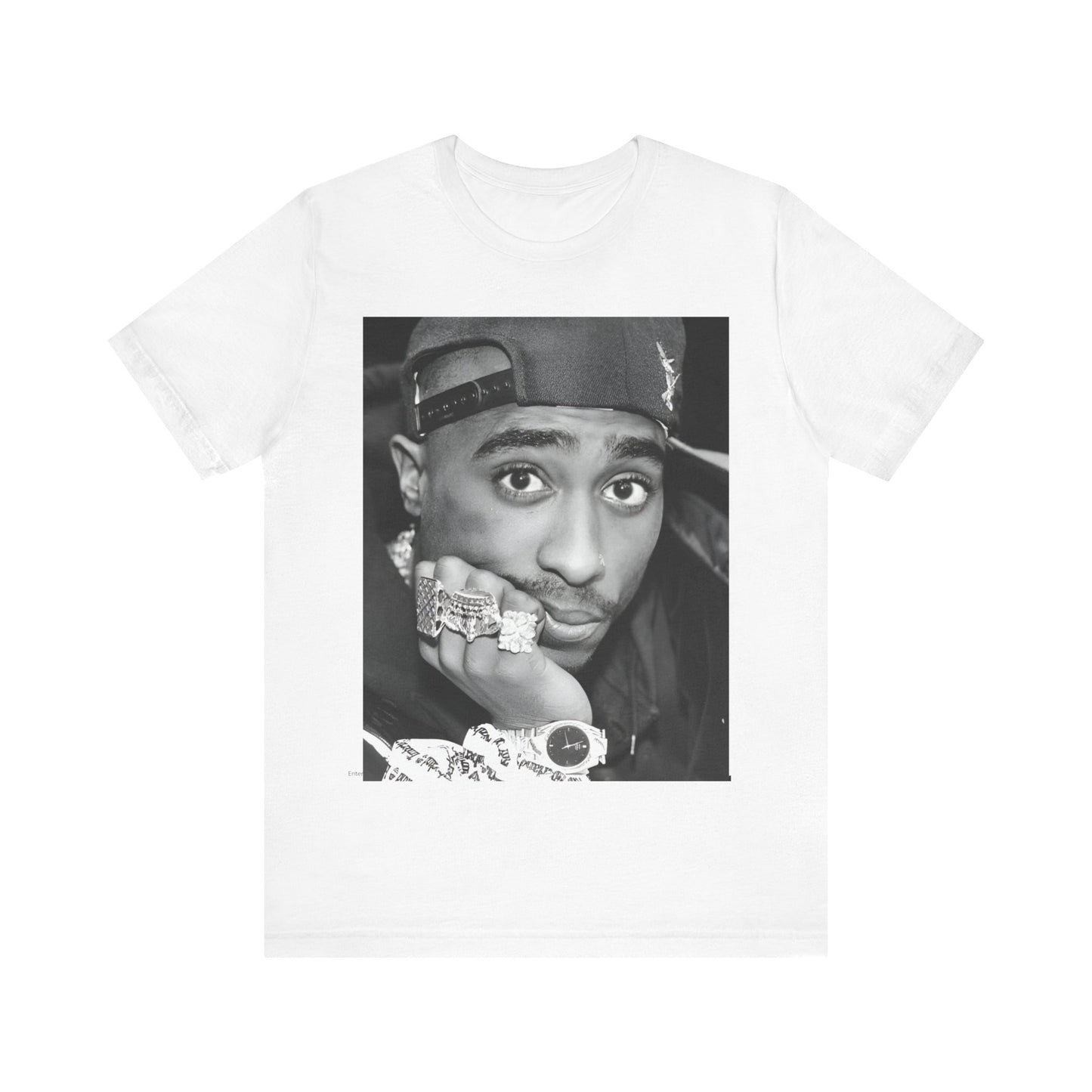 A black graphic t-shirt featuring a bold graphic of Tupac as a rap superstar.
