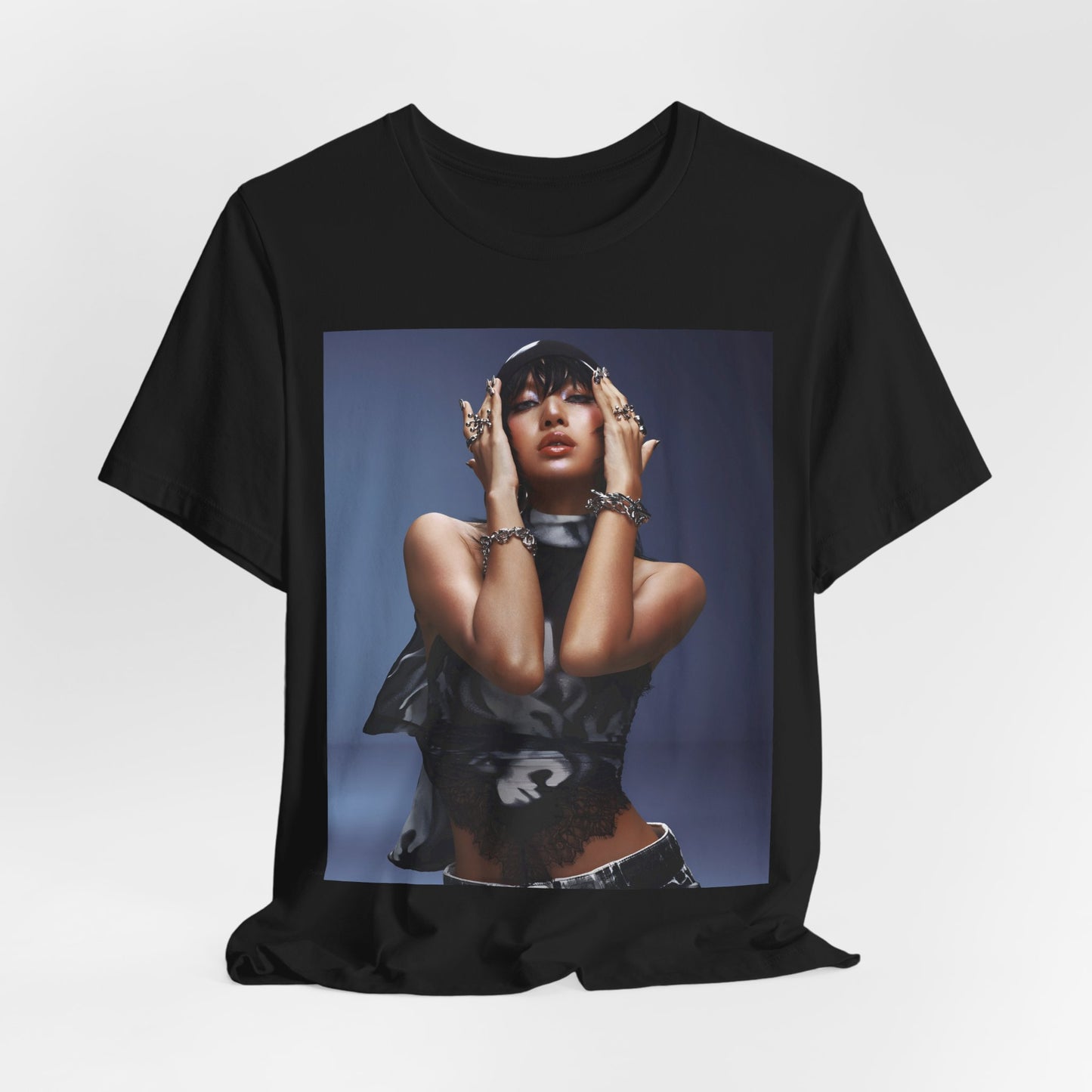A black graphic t-shirt featuring a bold visual graphic of Lisa from K-Pop.