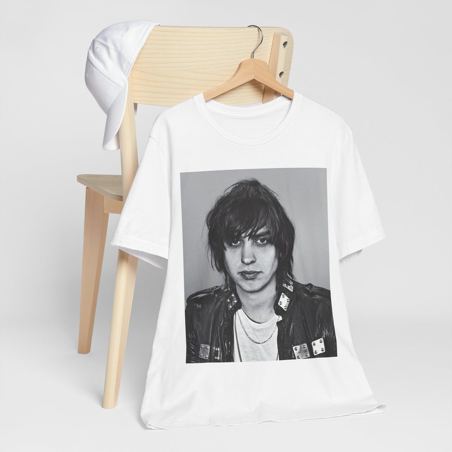 A black graphic t-shirt featuring a portrait photo of Julian Casablancas from The Strokes.