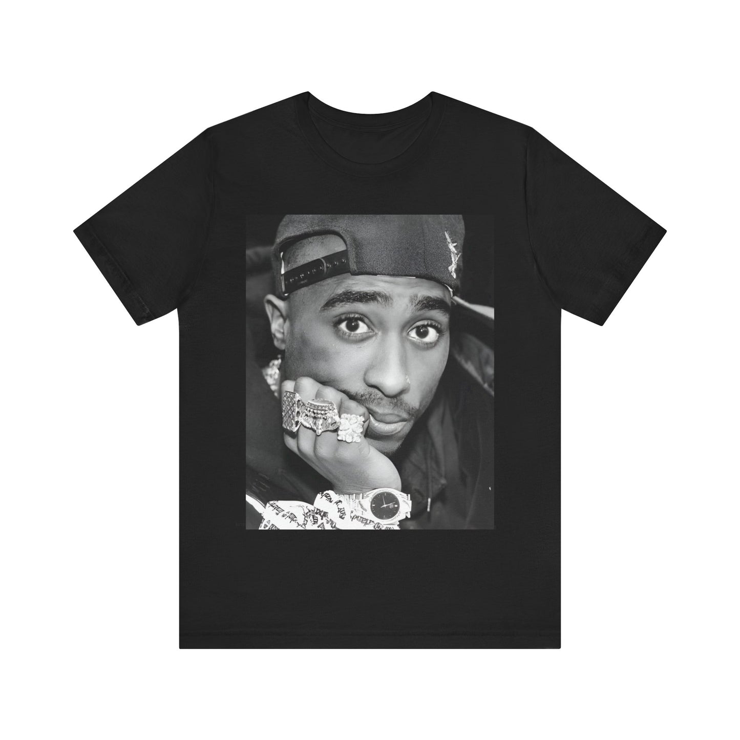 A black graphic t-shirt featuring a bold graphic of Tupac as a rap superstar.