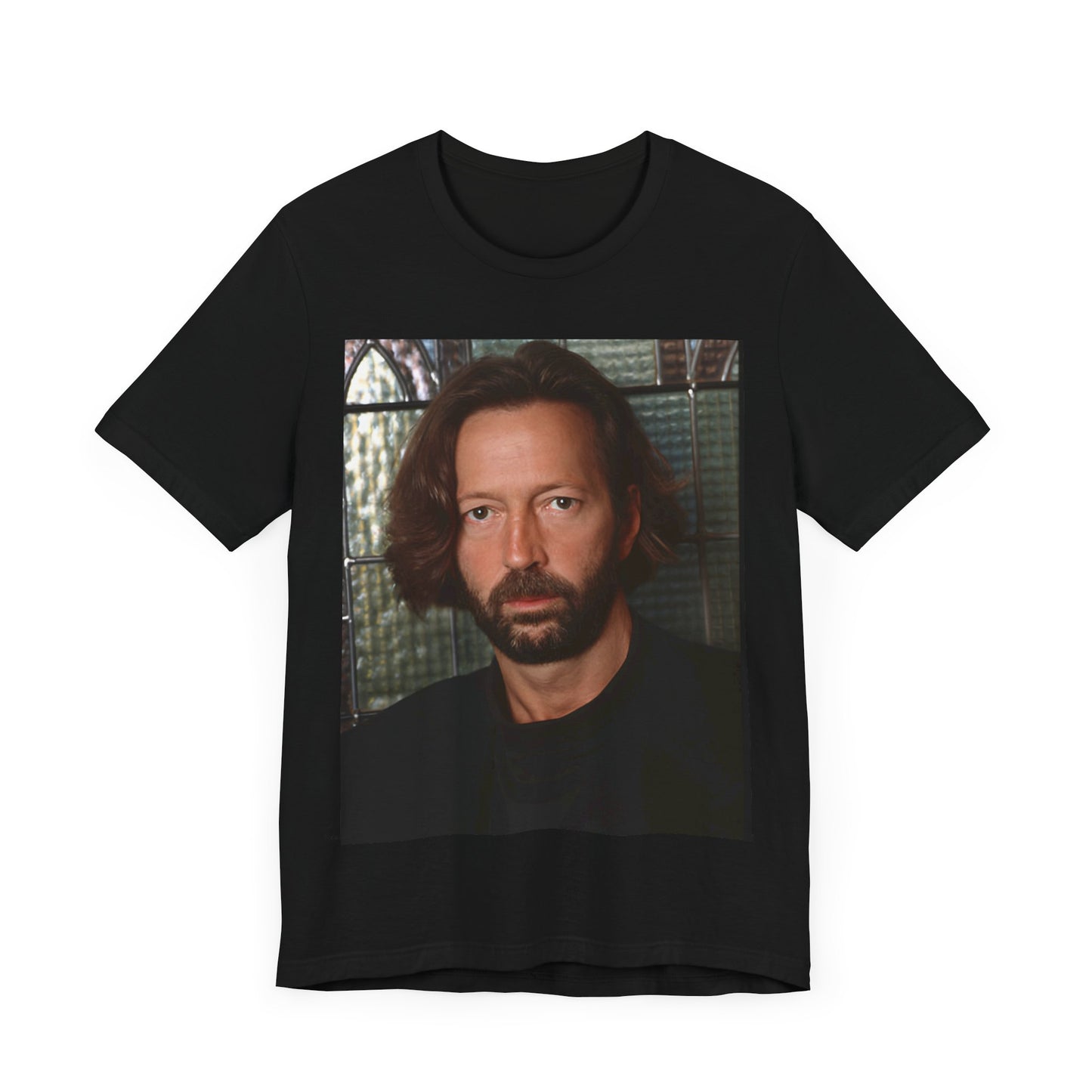 A black graphic t-shirt featuring a portrait graphic of Eric Clapton as a guitar god legend.