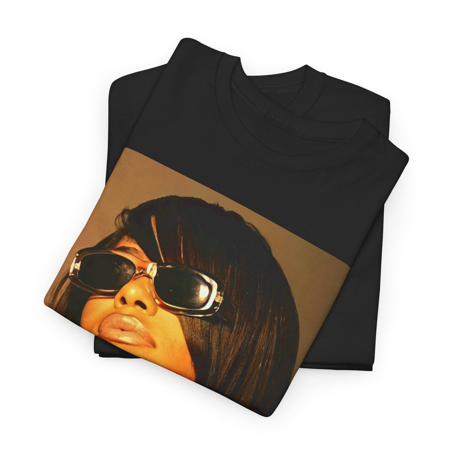 A black graphic t-shirt featuring a retro graphic related to Aaliyah's 'One in a Million' era.