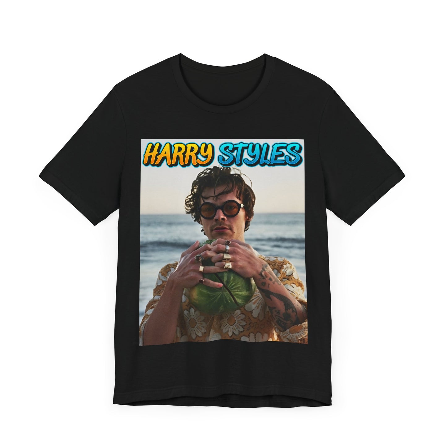 A black graphic t-shirt featuring a graphic related to Harry Styles' 'Watermelon Sugar' song or its viral impact.
