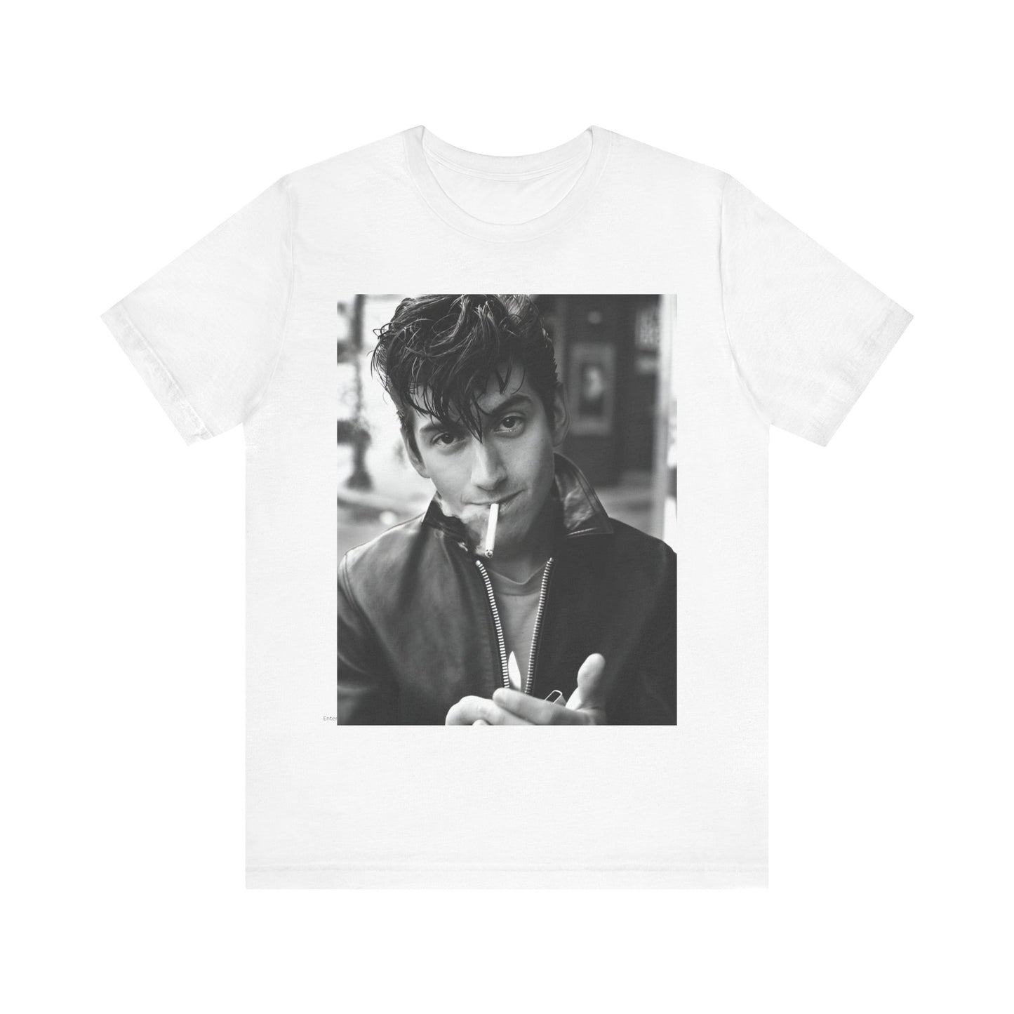 A black graphic t-shirt featuring a graphic of Alex Turner from Arctic Monkeys, in a rock star pose or setting.