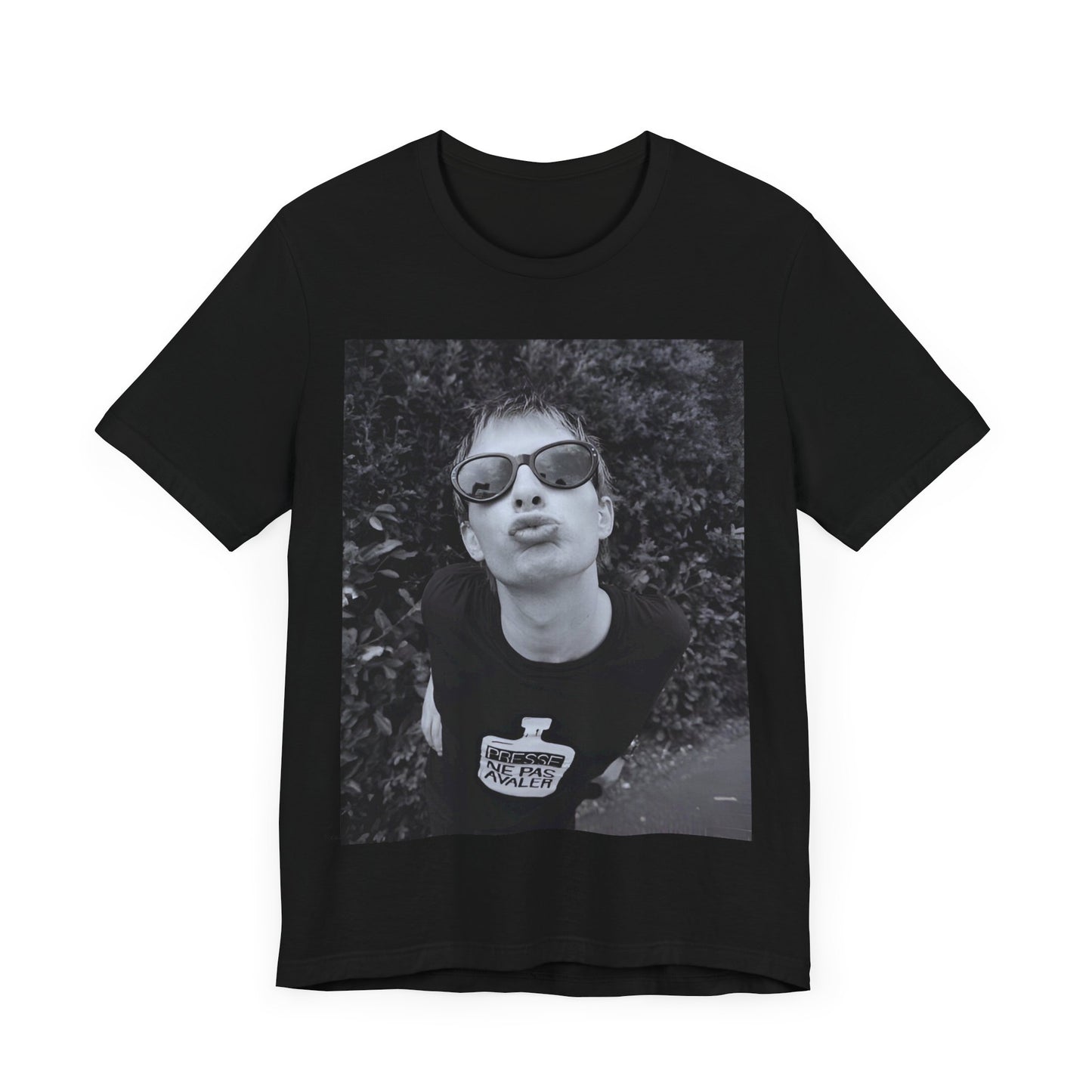 A black graphic t-shirt featuring a retro 90s graphic of Thom Yorke from Radiohead.