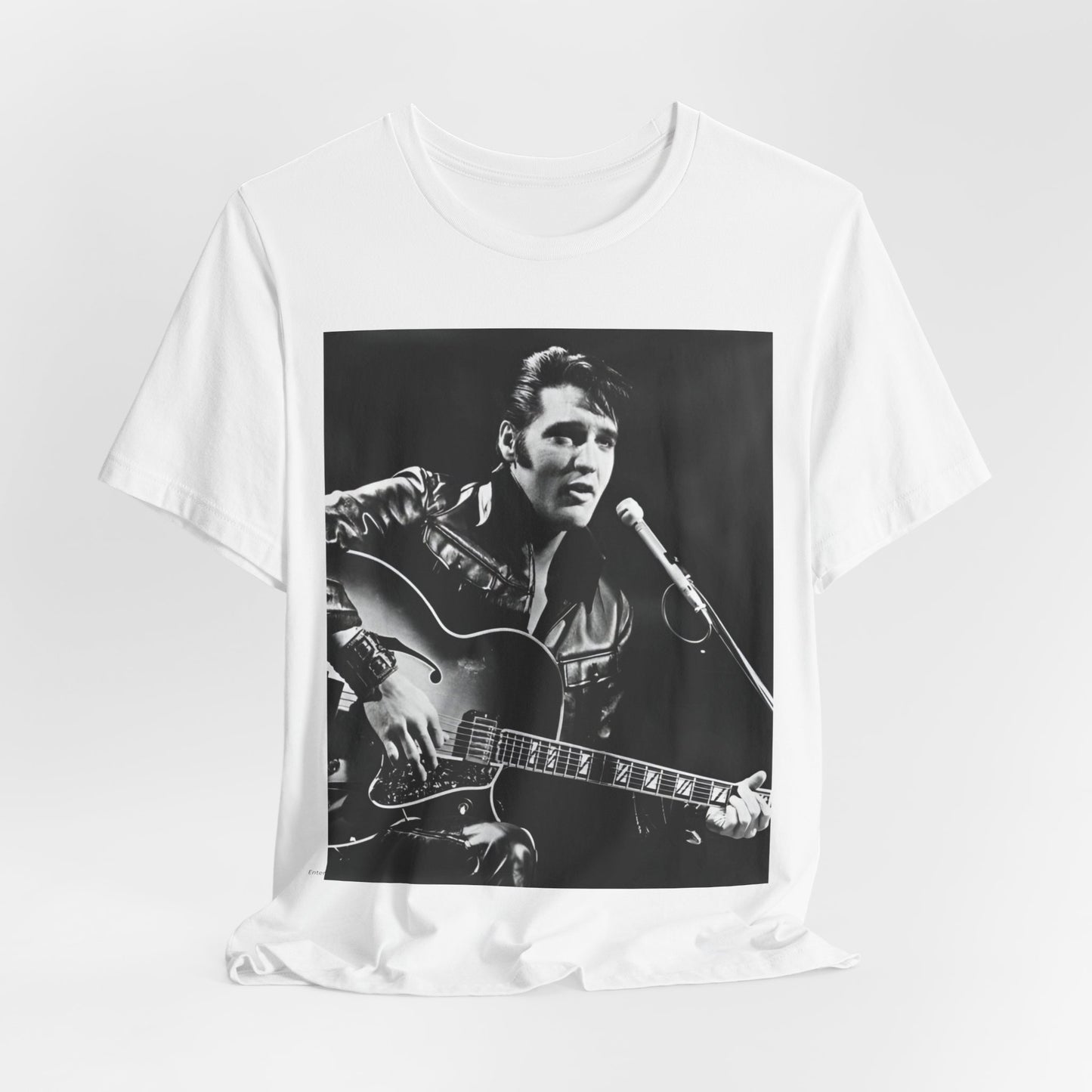 A black graphic t-shirt featuring a graphic related to Elvis Presley's 'Burning Love' song or era.