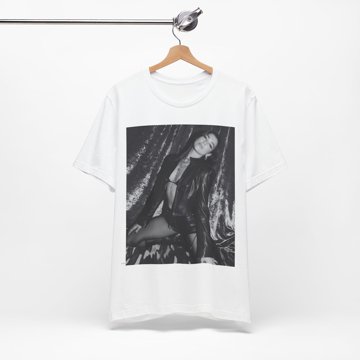 A black graphic t-shirt featuring a black and white portrait photo of Dua Lipa.