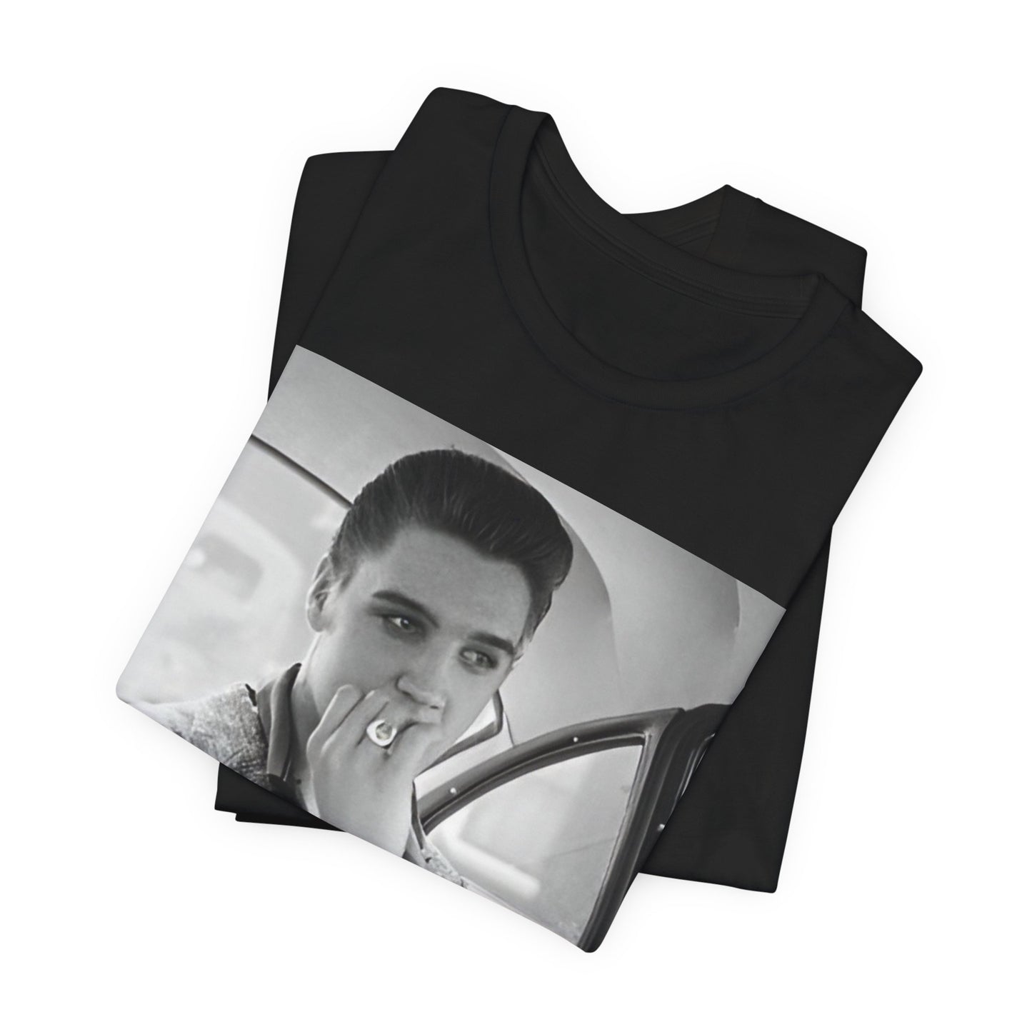 A black graphic t-shirt featuring a classic 50s era graphic of Elvis Presley.