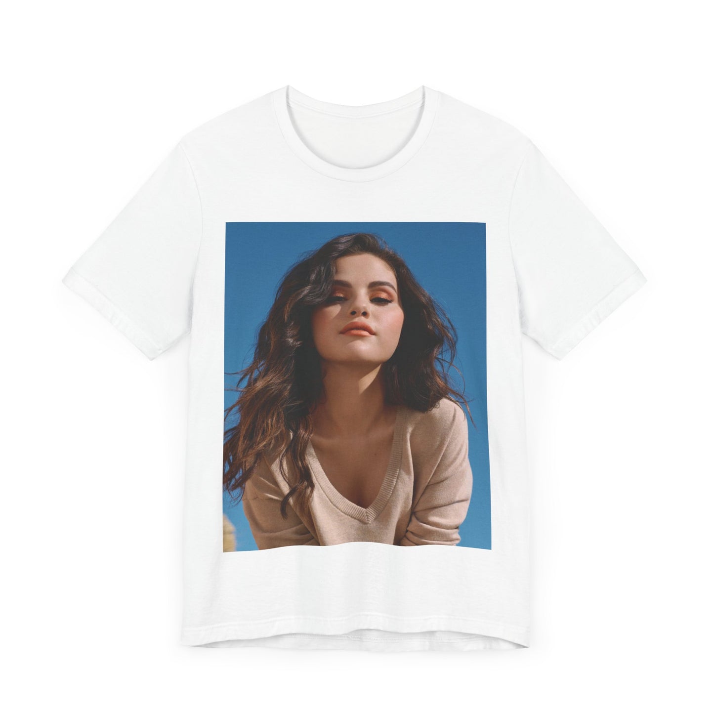 A black graphic t-shirt featuring a vintage pop icon graphic of Selena Gomez.