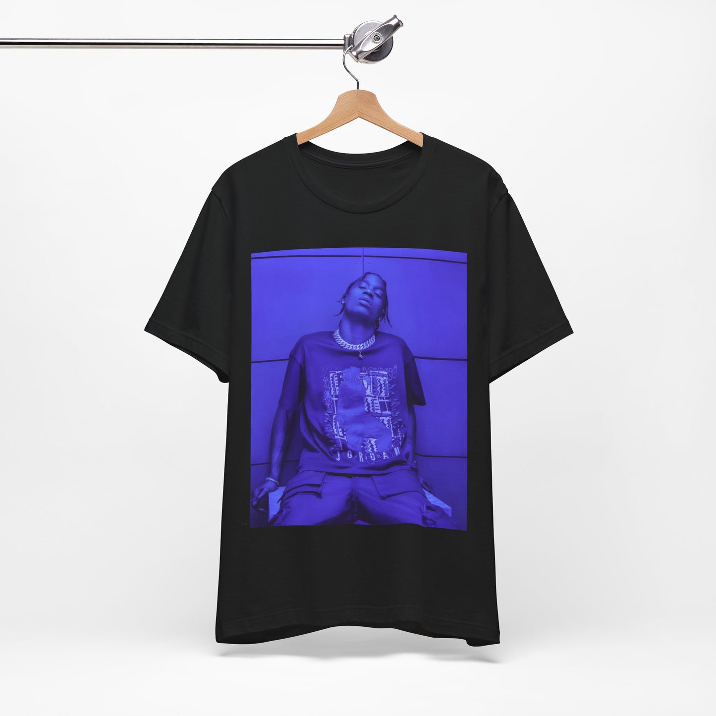 A black graphic t-shirt featuring a timeless trap star graphic of Travis Scott.