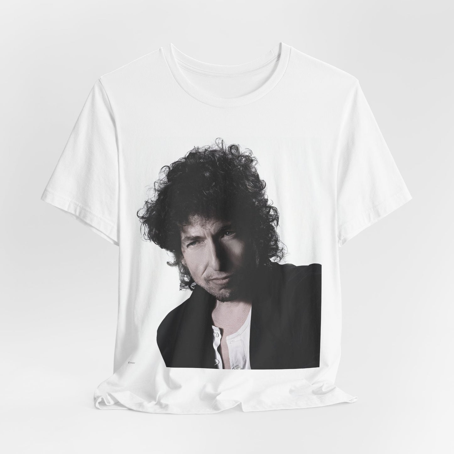 A black graphic t-shirt featuring a timeless folk rock graphic of Bob Dylan, possibly with his guitar or harmonica.