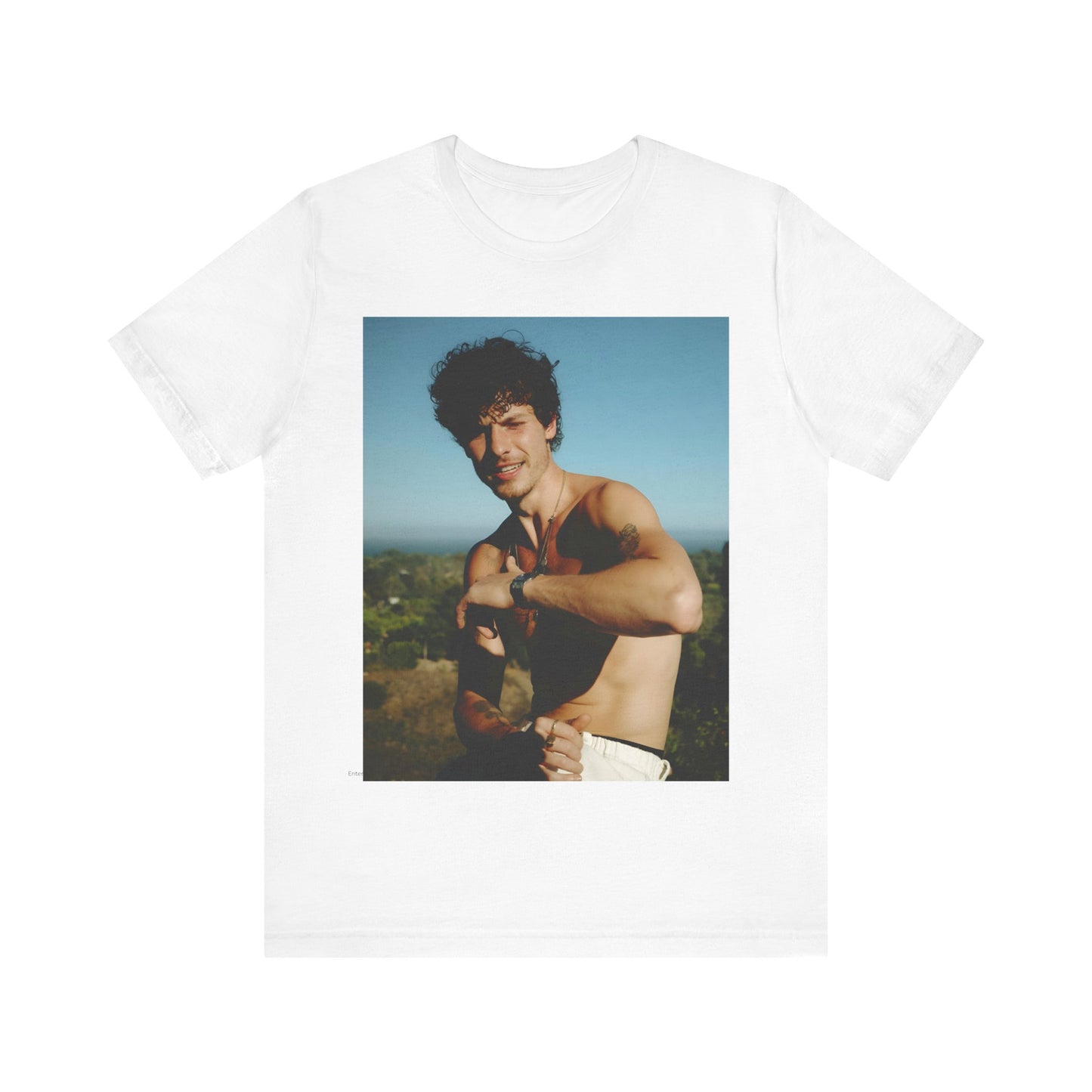 A black graphic t-shirt featuring a graphic of Shawn Mendes with a chill pop star look.