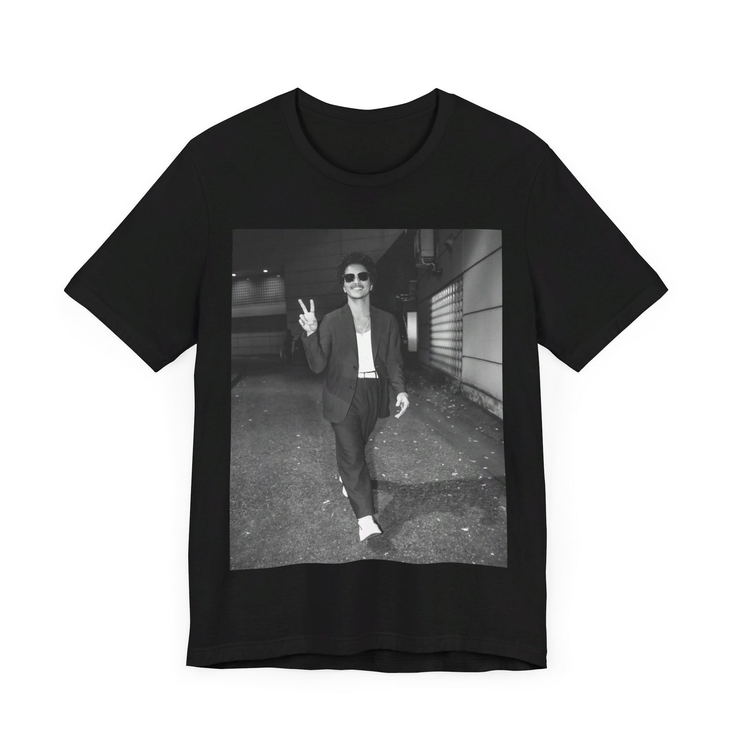 A black graphic t-shirt featuring a black and white graphic or photo of Bruno Mars in a backstage setting.