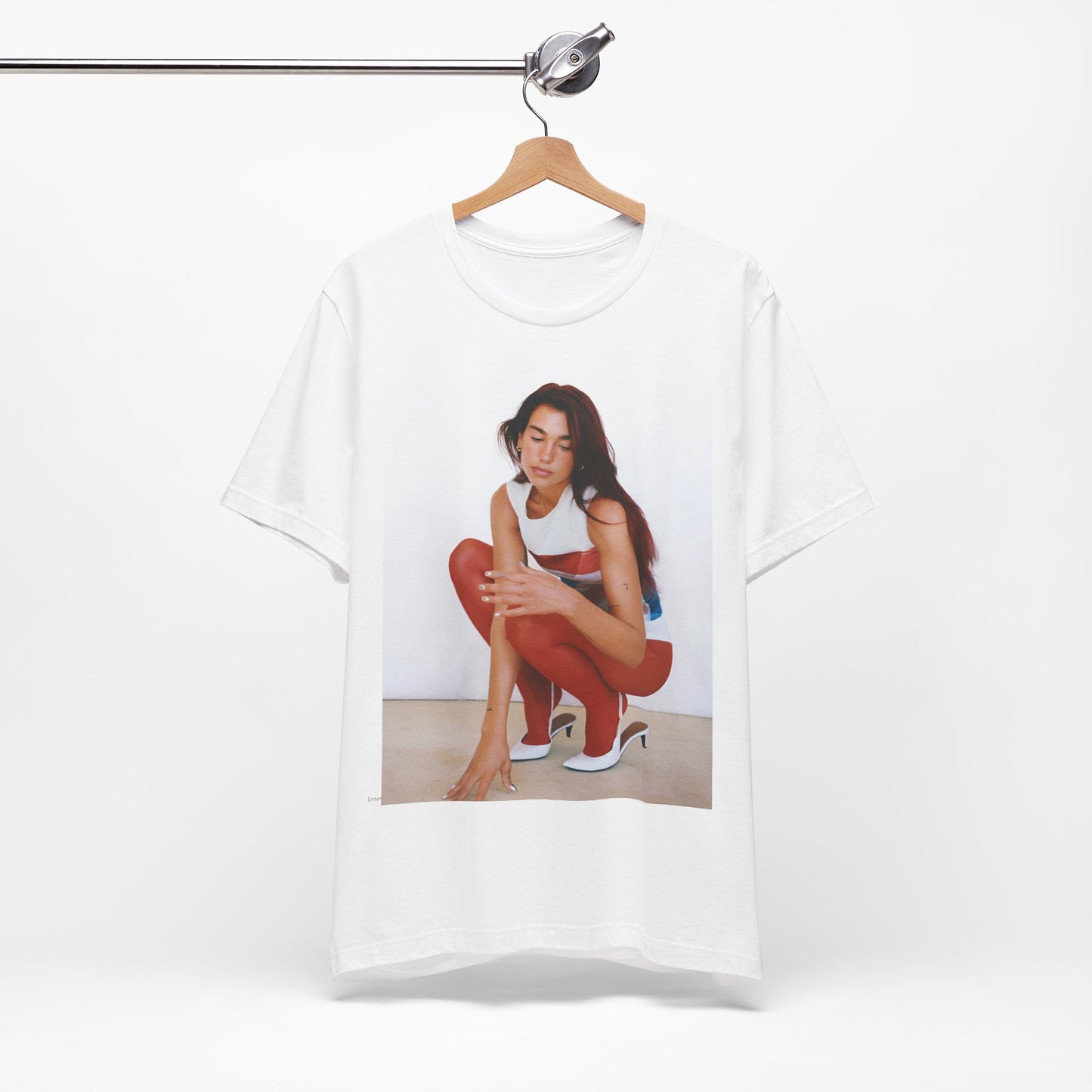 A black graphic t-shirt featuring a graphic of Dua Lipa with a chill pop vibe, designed for comfort.