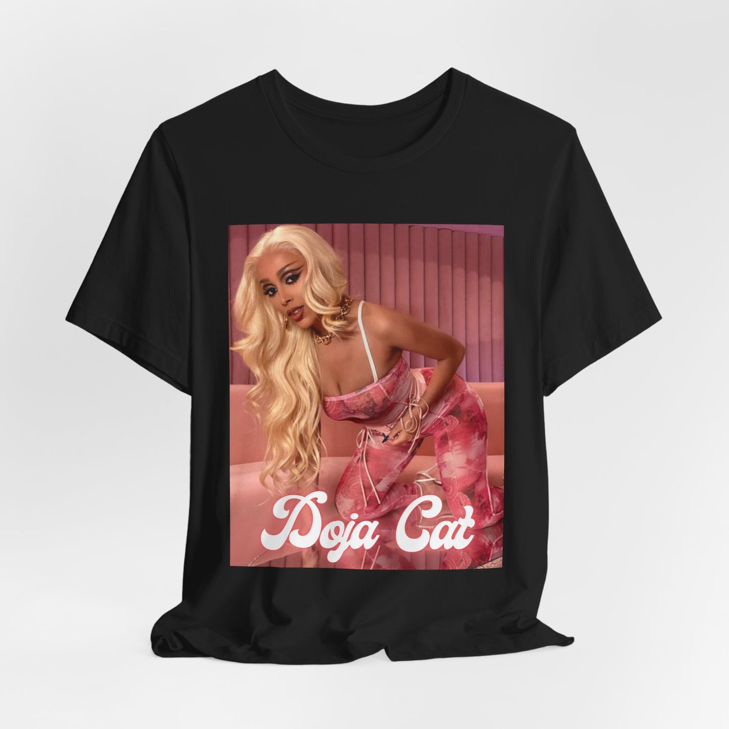 A black graphic t-shirt featuring a graphic related to Doja Cat's 'Planet Her' album era.