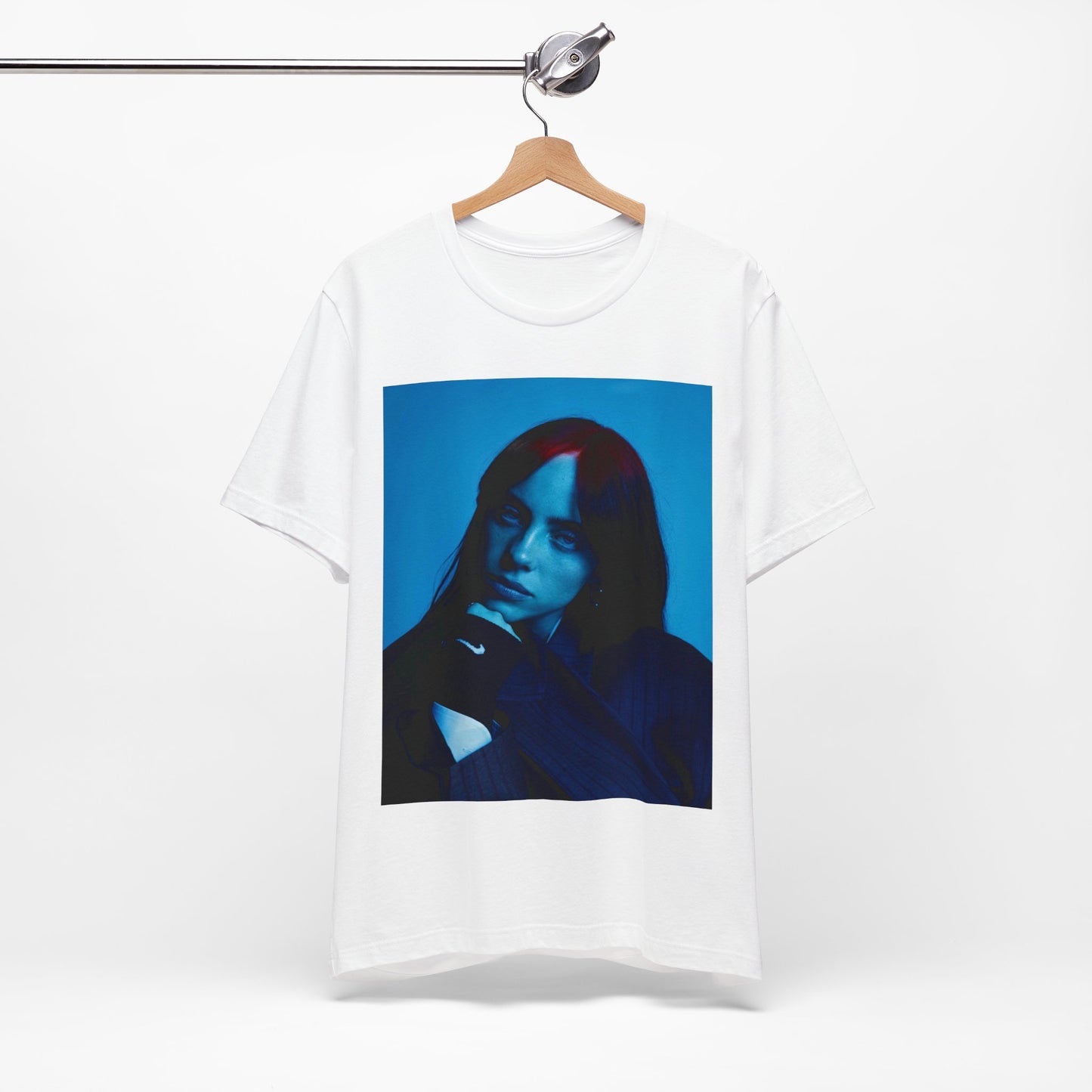 A soft, slightly blurred photo of Billie Eilish, evoking the dreamy and nostalgic feel of her song 'Ocean Eyes,' printed on a t-shirt.
