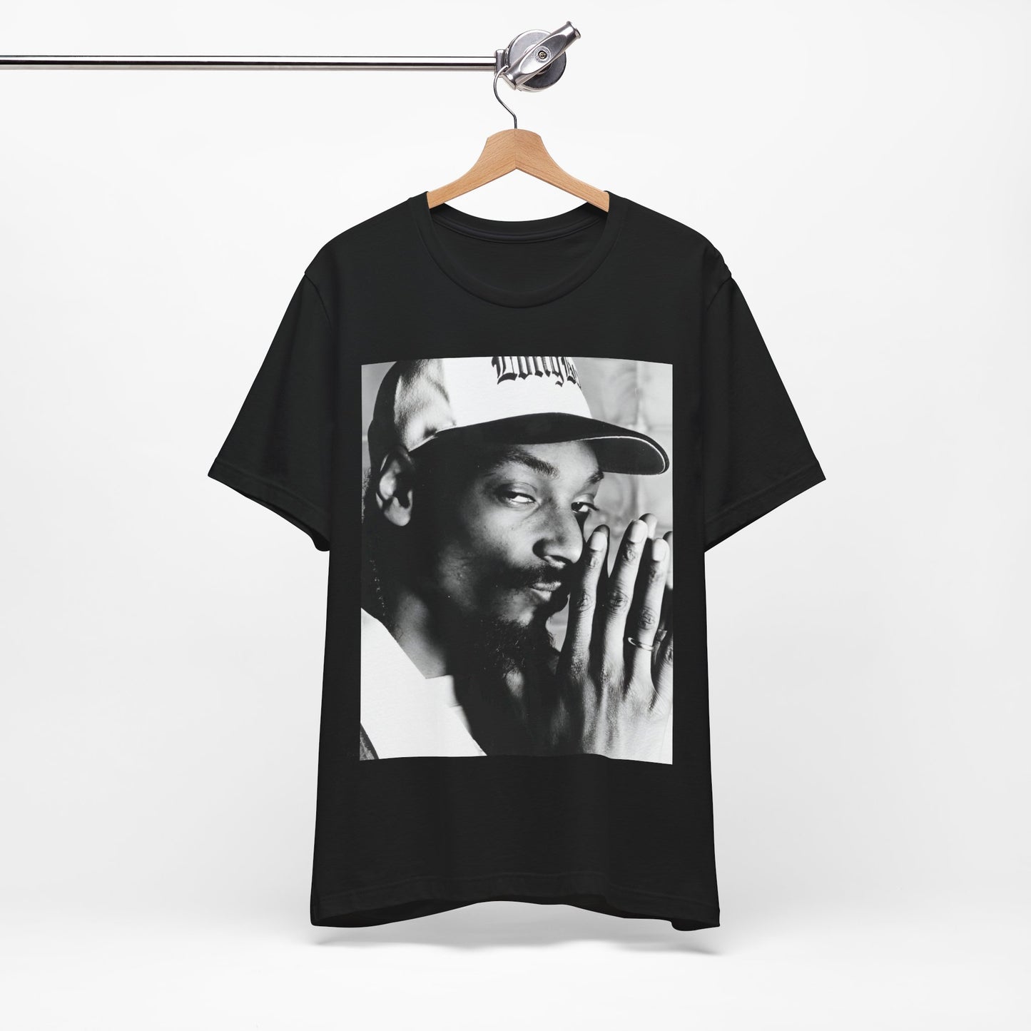 A black graphic t-shirt featuring a cool black and white graphic or photo of Snoop Dogg as a rapper.