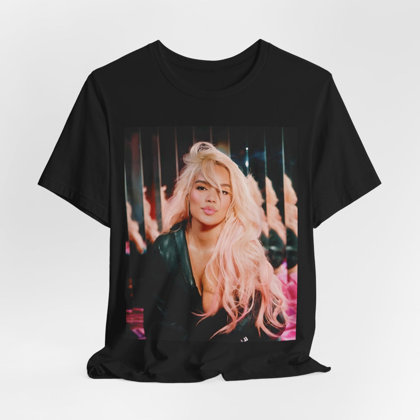 A black graphic t-shirt featuring a graphic of Karol G as an empowered Latina icon.