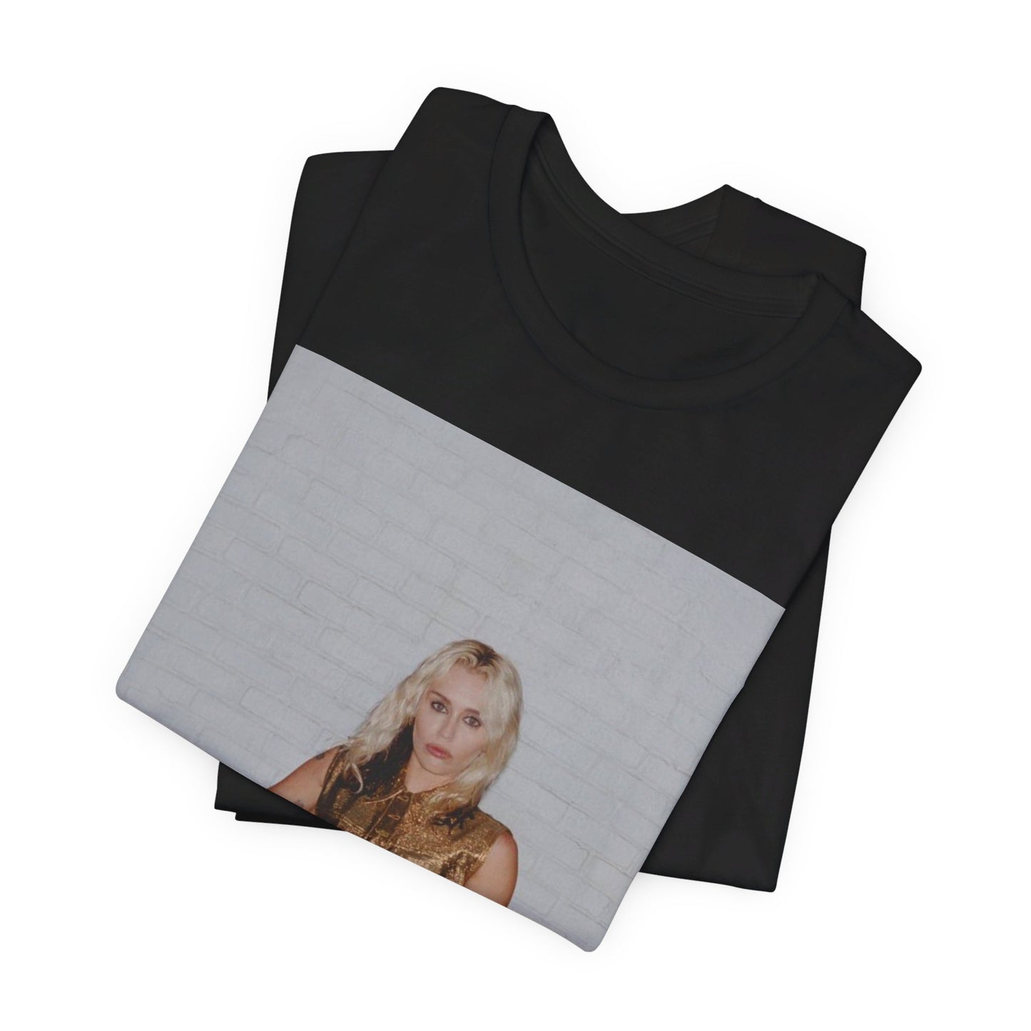 A black graphic t-shirt featuring an iconic fashion graphic of Miley Cyrus.
