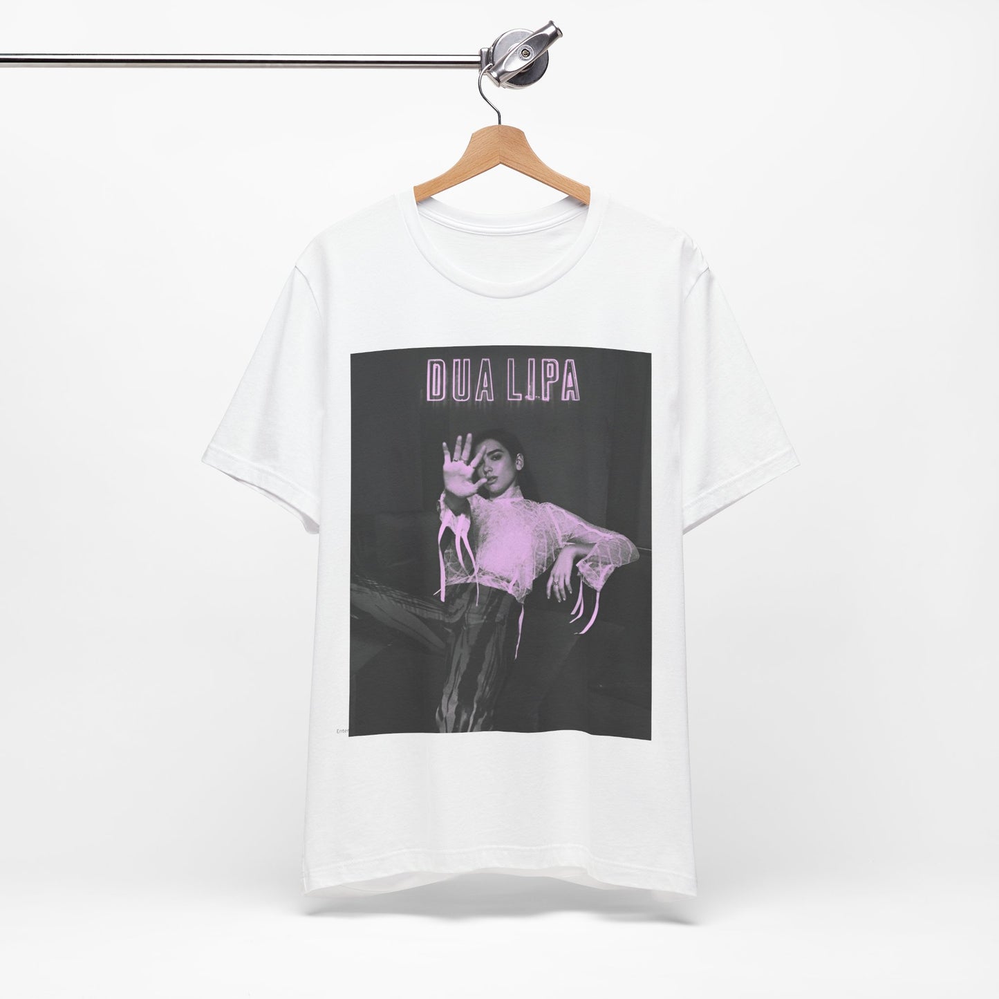 A black graphic t-shirt featuring a photo of Dua Lipa with a pink monochrome effect.