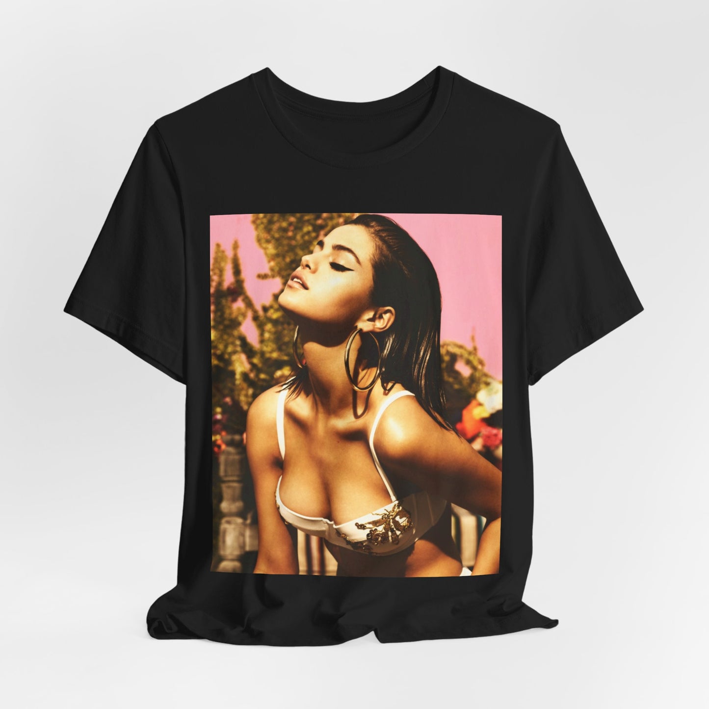 A black graphic t-shirt featuring a graphic of Selena Gomez emphasizing her timeless beauty.