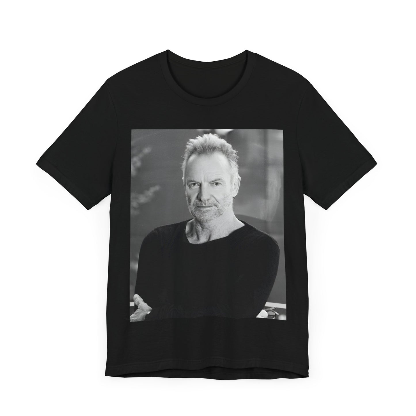 A black graphic t-shirt featuring a vintage graphic related to Sting's 'Desert Rose' song or era.