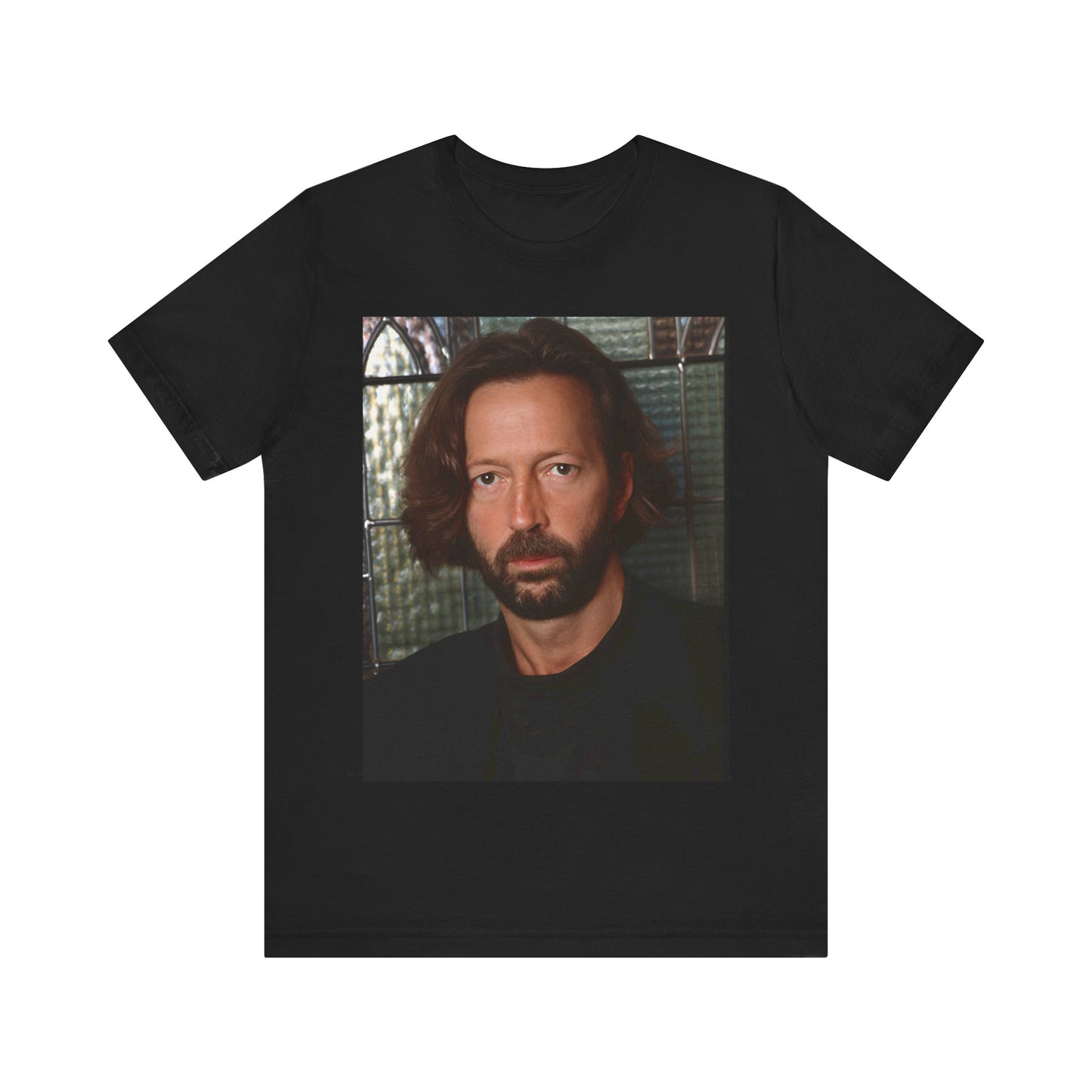 A black graphic t-shirt featuring a portrait graphic of Eric Clapton as a guitar god legend.