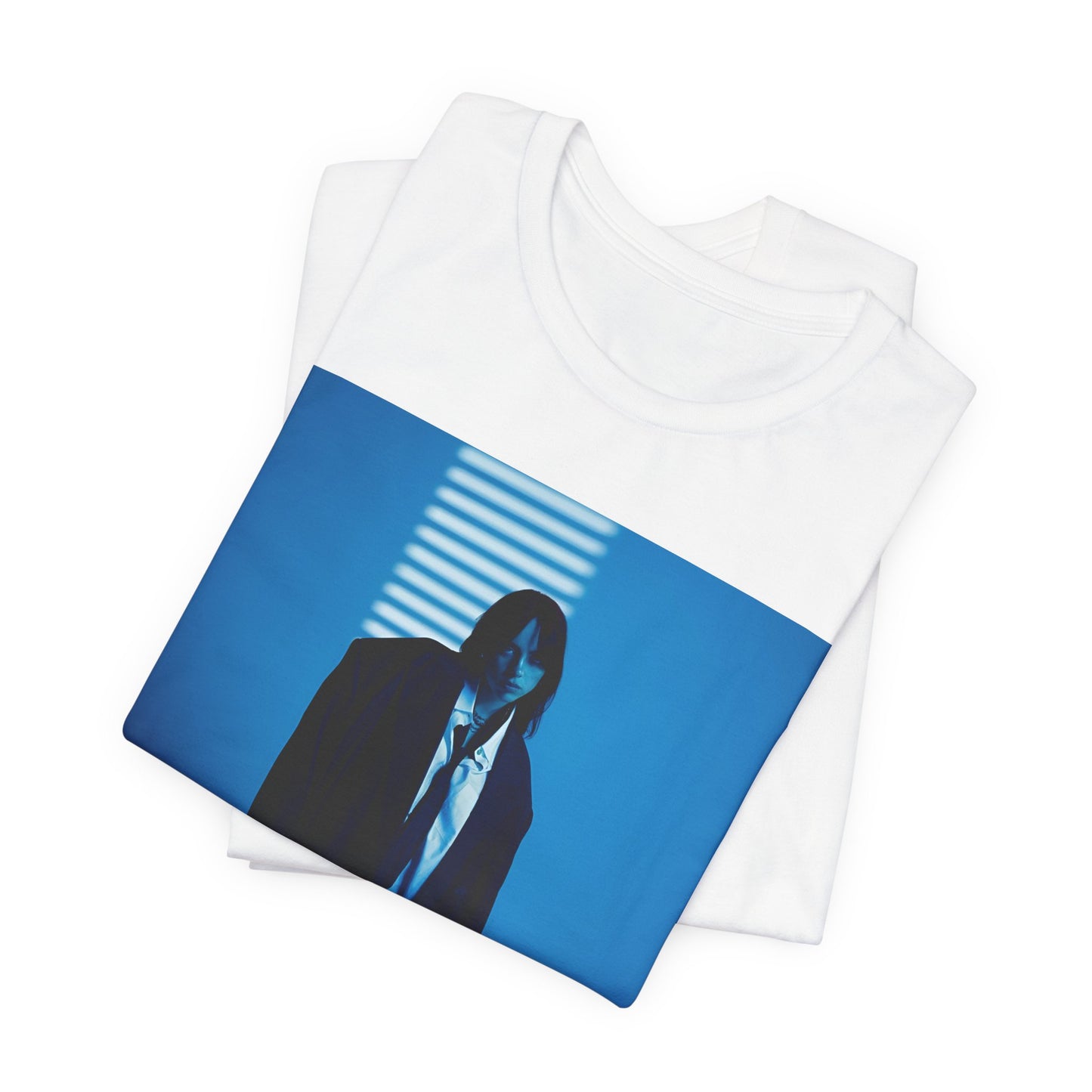 A high-fashion, editorial-style photo of Billie Eilish, embodying a 'breaking the rules' attitude, printed on a graphic t-shirt.