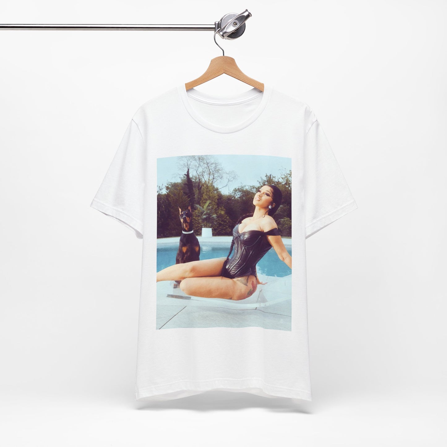 A black graphic t-shirt featuring a graphic related to Cardi B's 'I Like It' song, with bold pop culture elements.