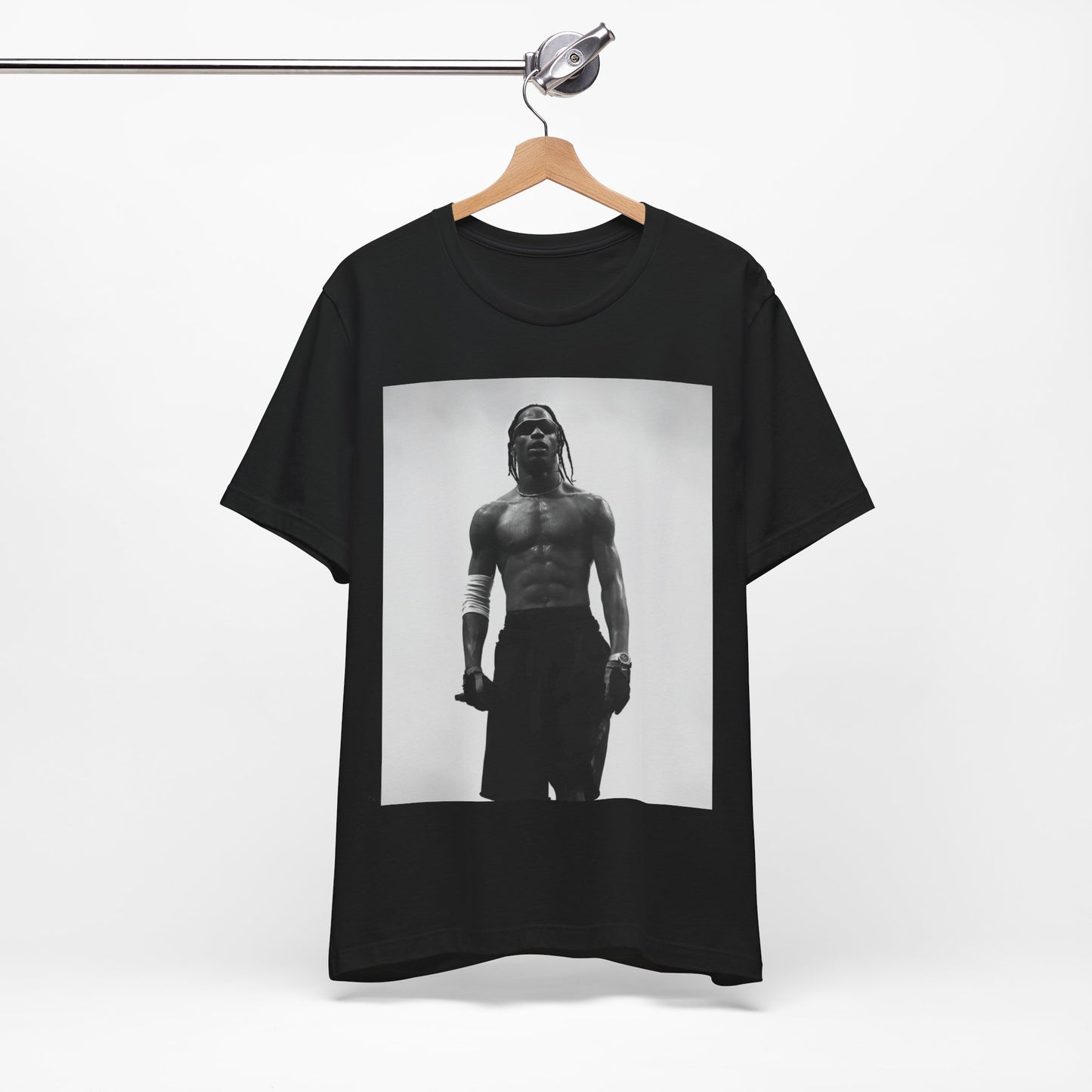 A black graphic t-shirt featuring a black and white portrait photo of Travis Scott.