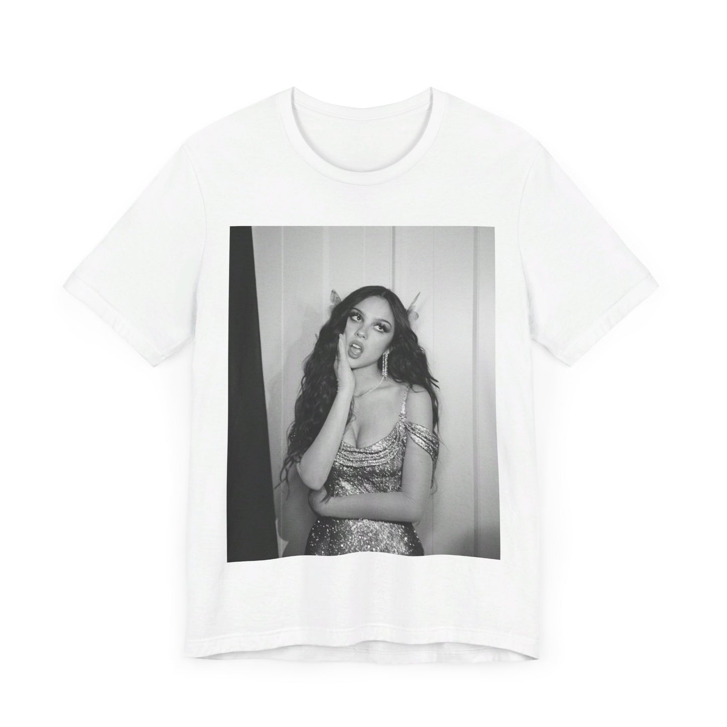 A black graphic t-shirt featuring a black and white, monochrome graphic or photo of Olivia Rodrigo.