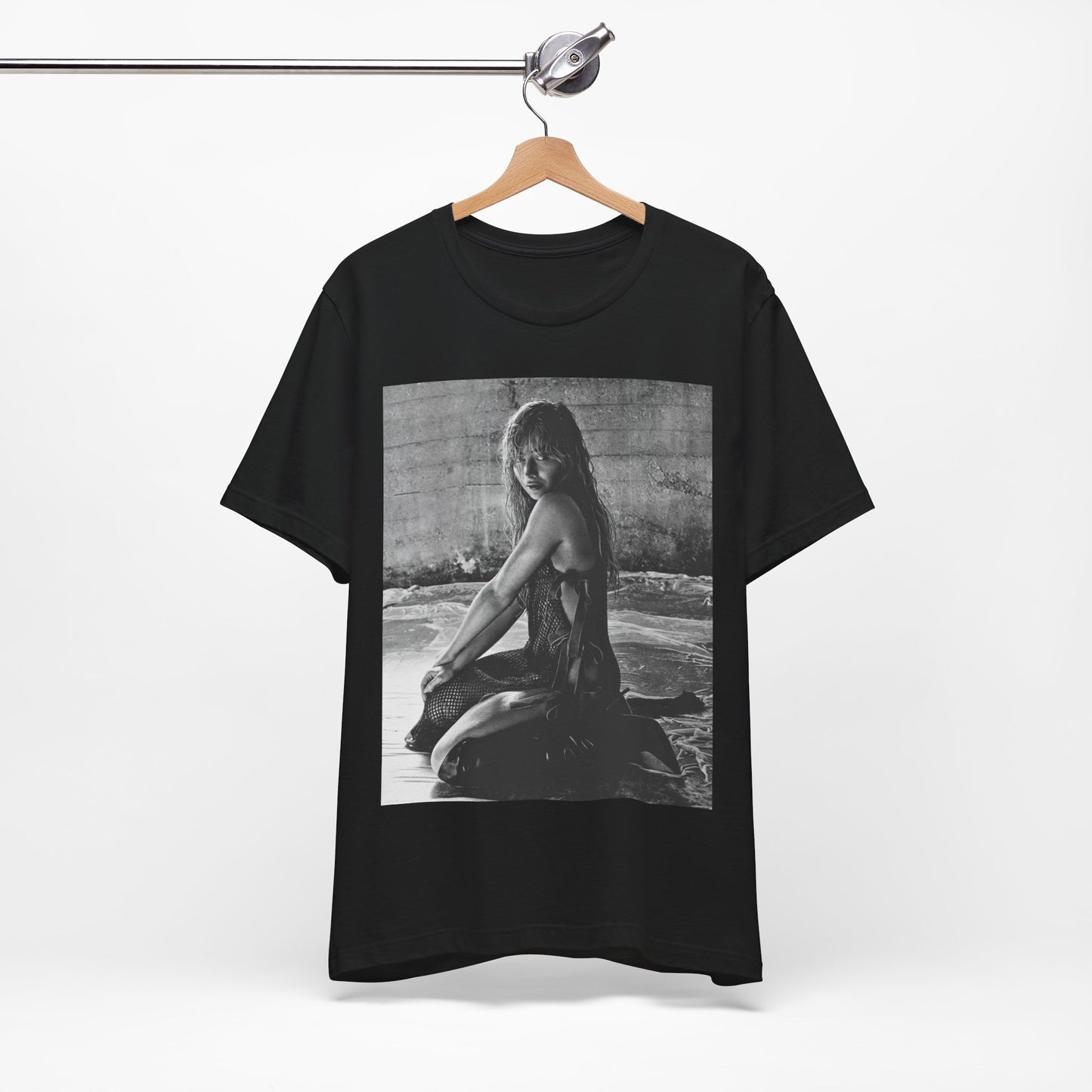 A black graphic t-shirt featuring a black and white, monochrome graphic or photo of Sabrina Carpenter.